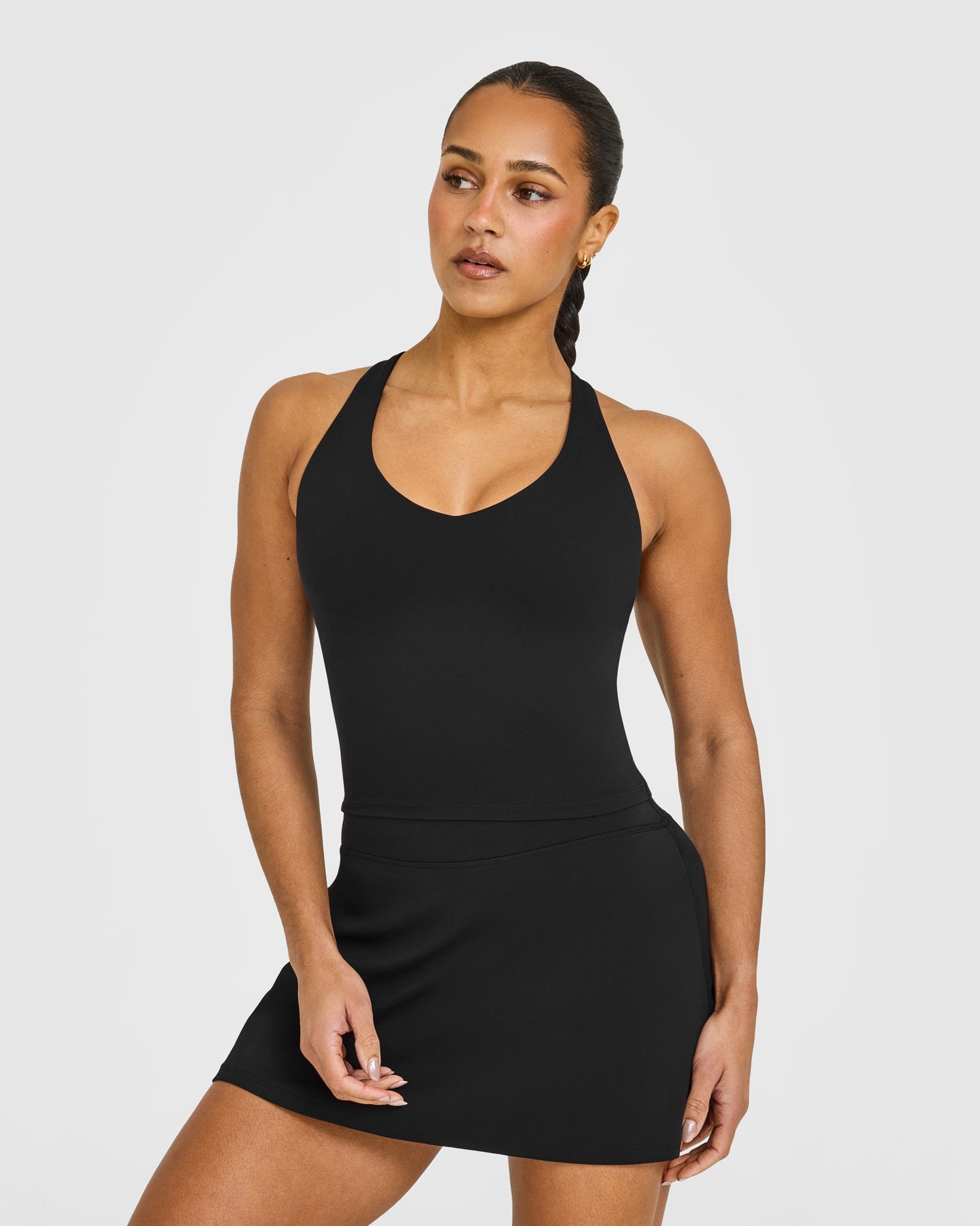 SoftMotion Racer Back Mid Vest with Built in Bra Shelf with White Logo | Black