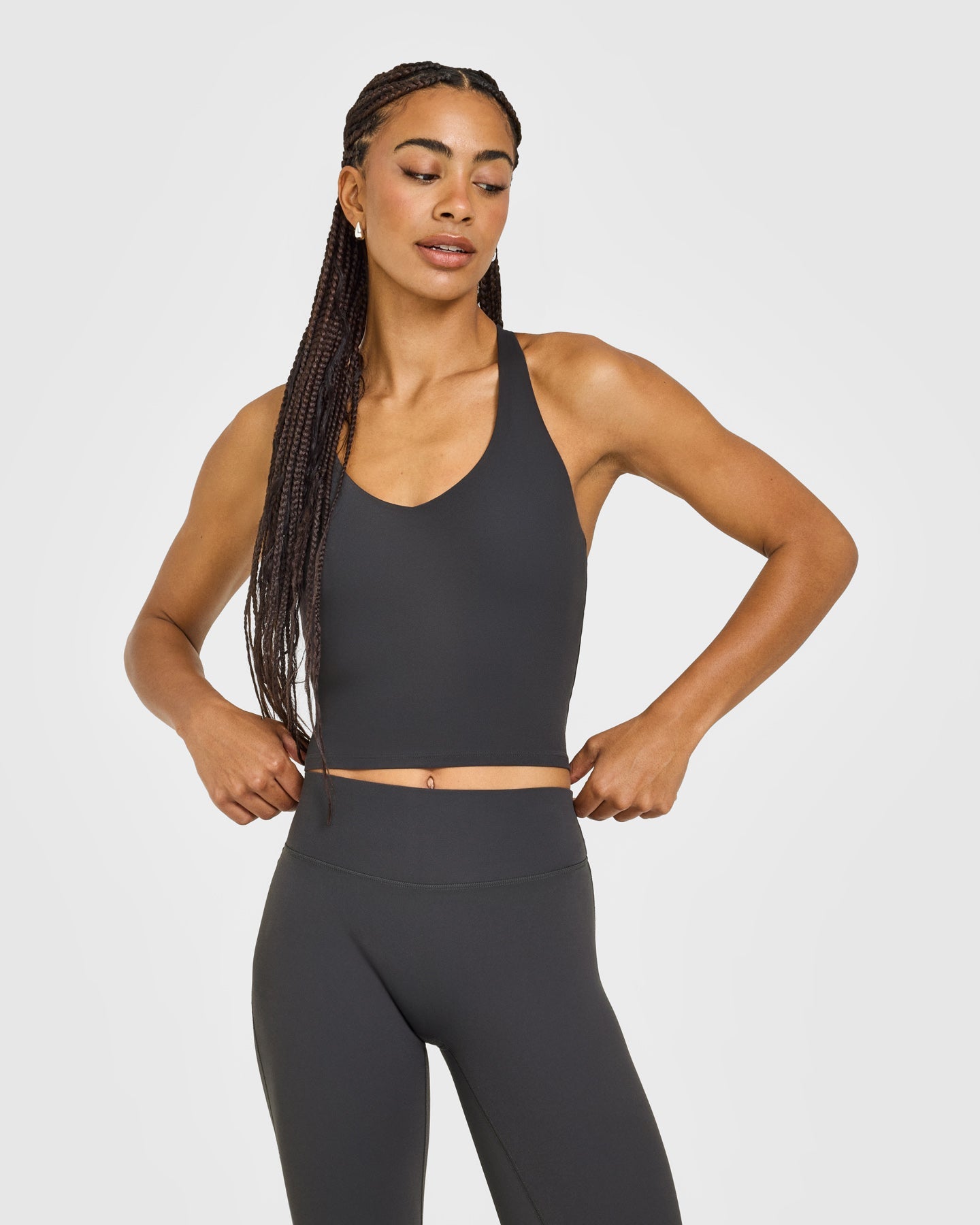 SoftMotion Racer Back Mid Vest with Built in Bra Shelf with White Logo | Coal