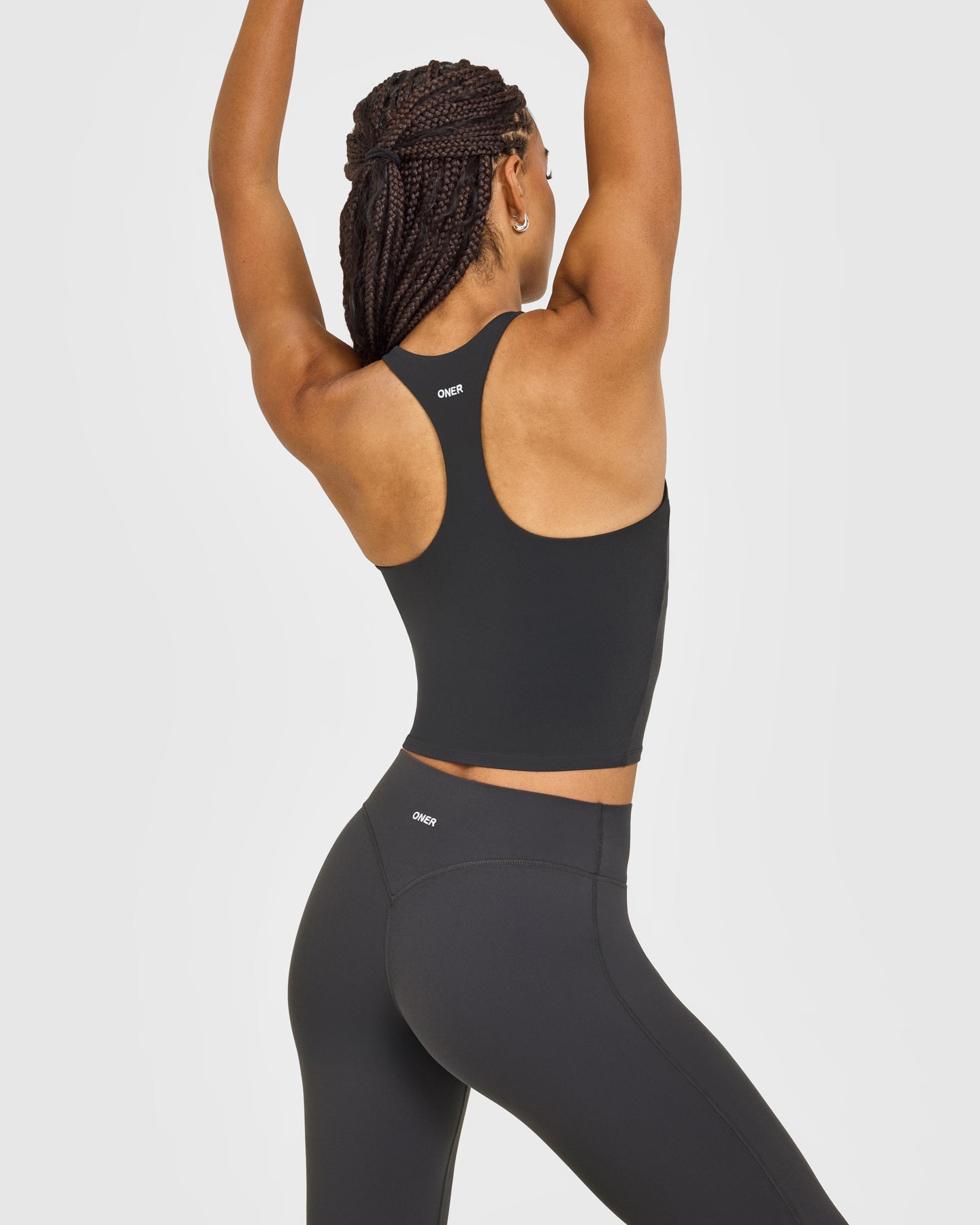 Alternative view of SoftMotion Racer Back Mid Vest with Built in Bra Shelf with White Logo | Coal