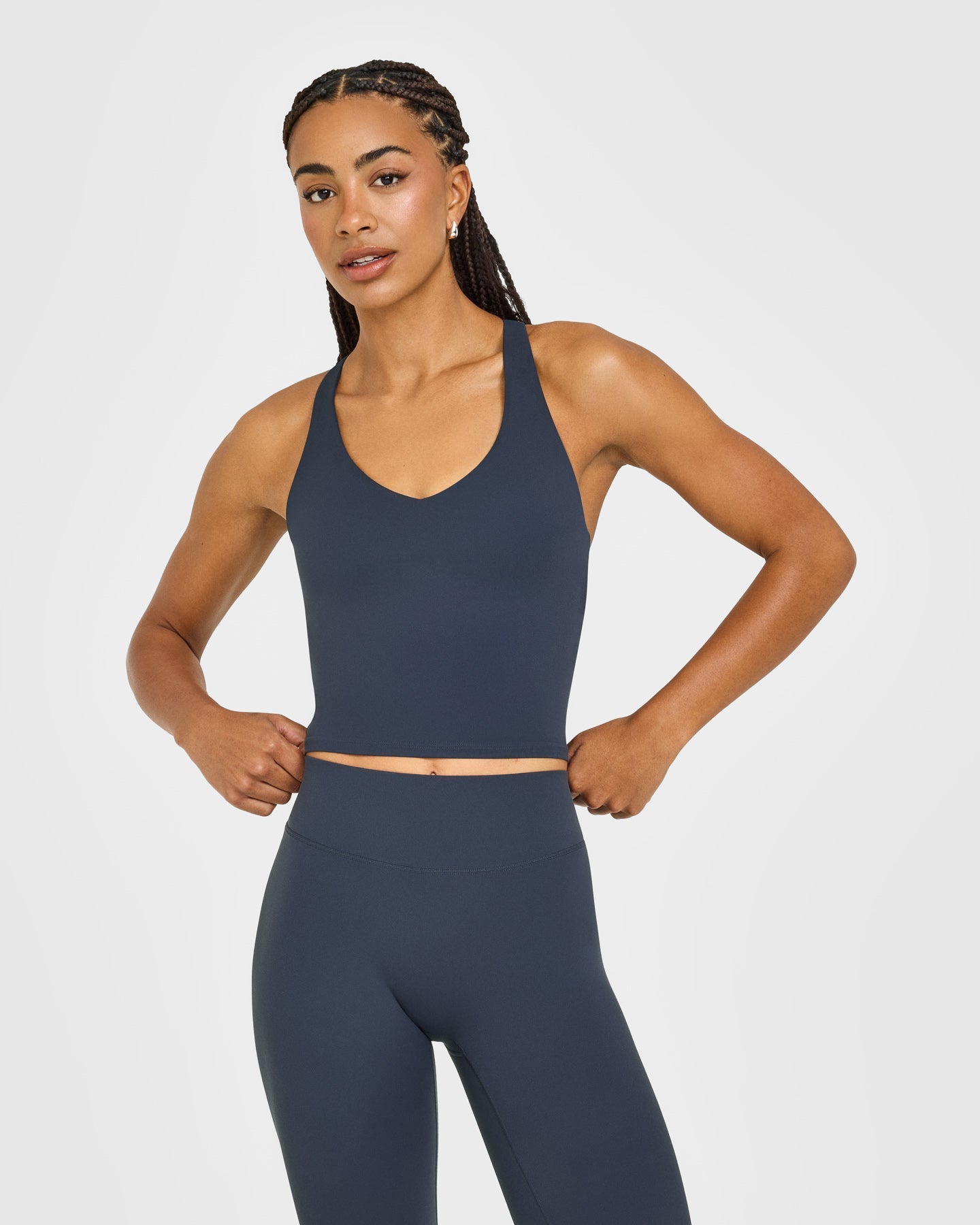 SoftMotion Racer Back Mid Vest with Built in Bra Shelf with White Logo | True Blue