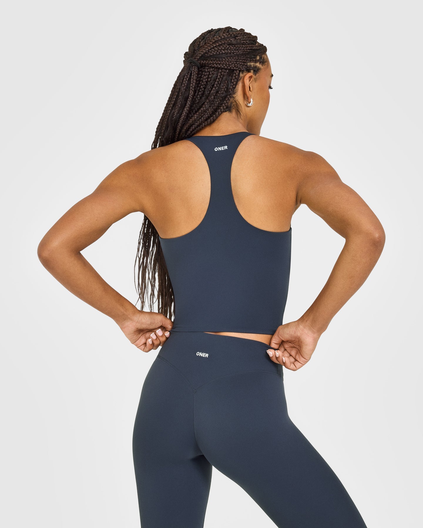 Alternative view of SoftMotion Racer Back Mid Vest with Built in Bra Shelf with White Logo | True Blue