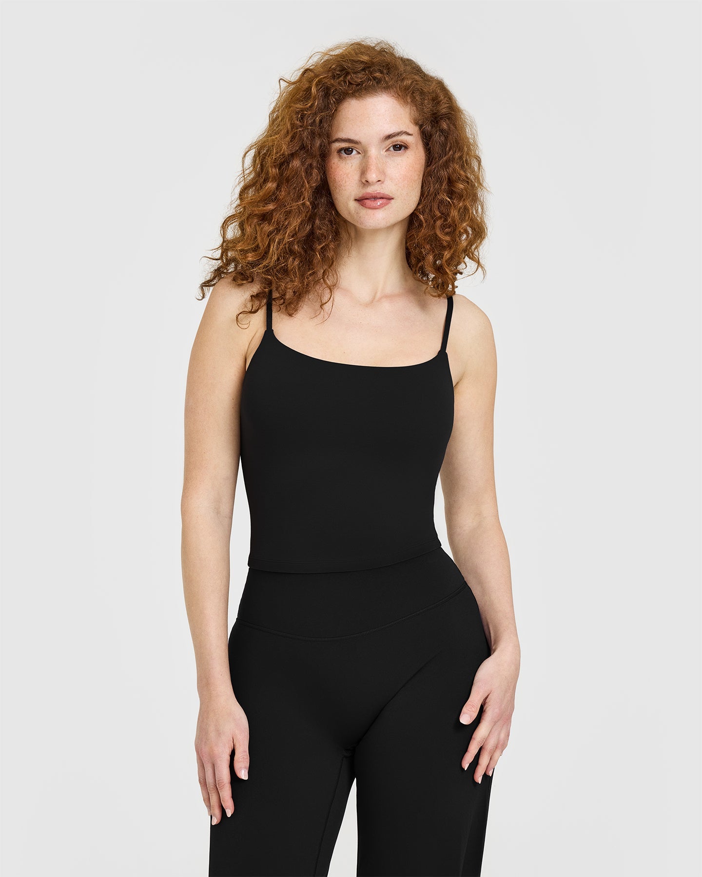 SoftMotion Strappy Mid Vest with Built in Bra Shelf with White Logo | Black