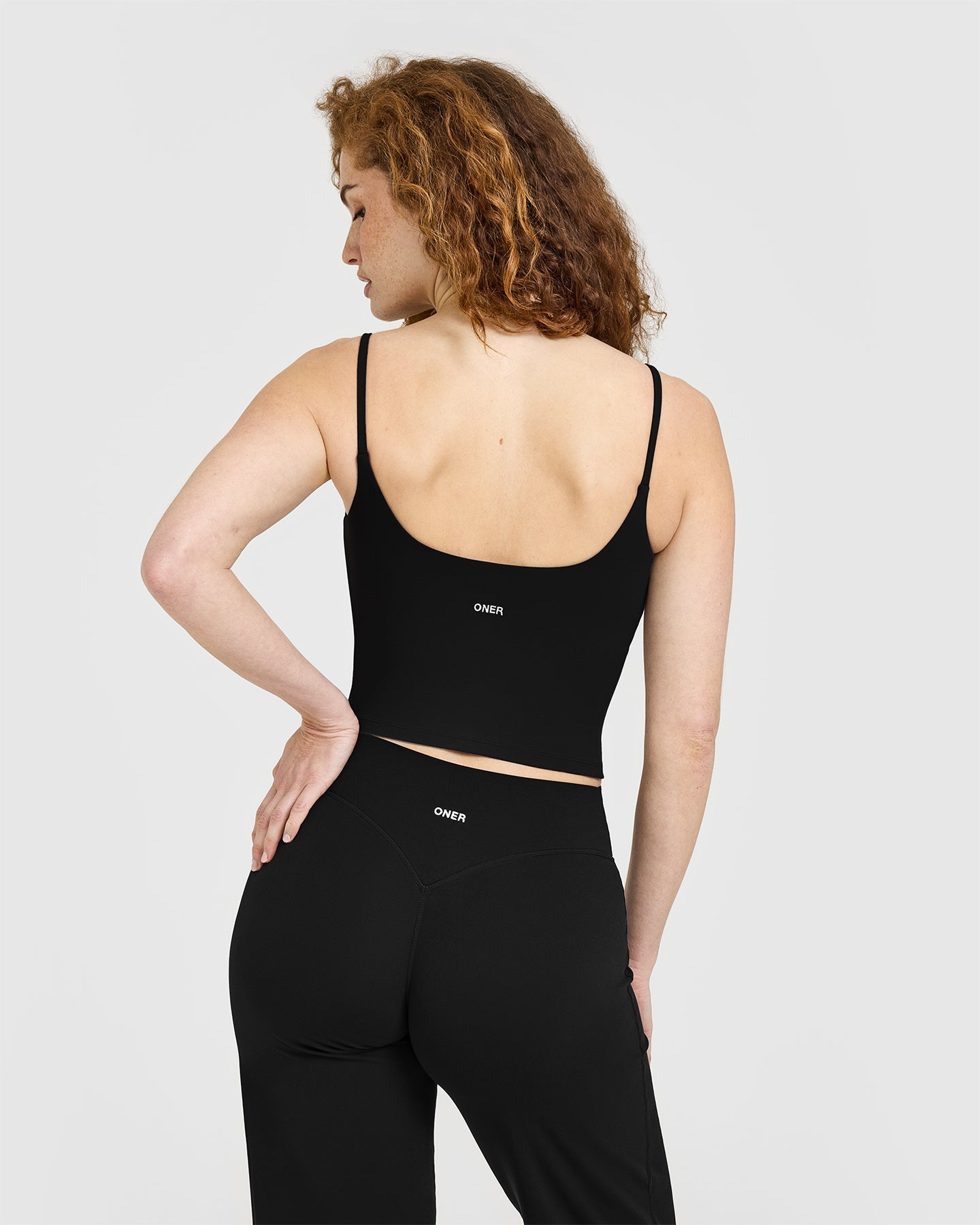 Alternative view of SoftMotion Strappy Mid Vest with Built in Bra Shelf with White Logo | Black