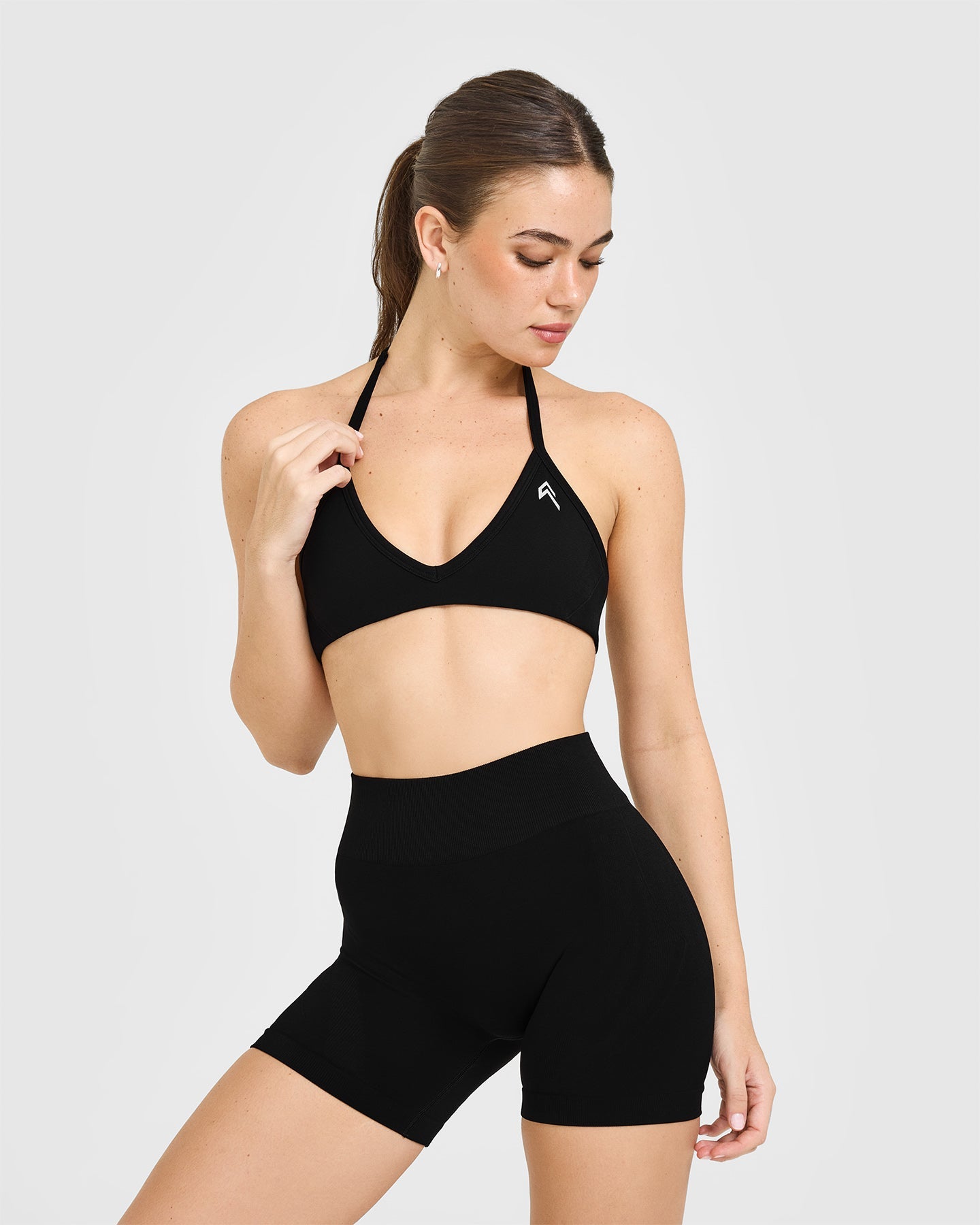 EnhanceLift Seamless Minimal Halter Neck Bralette with White Logo | Black