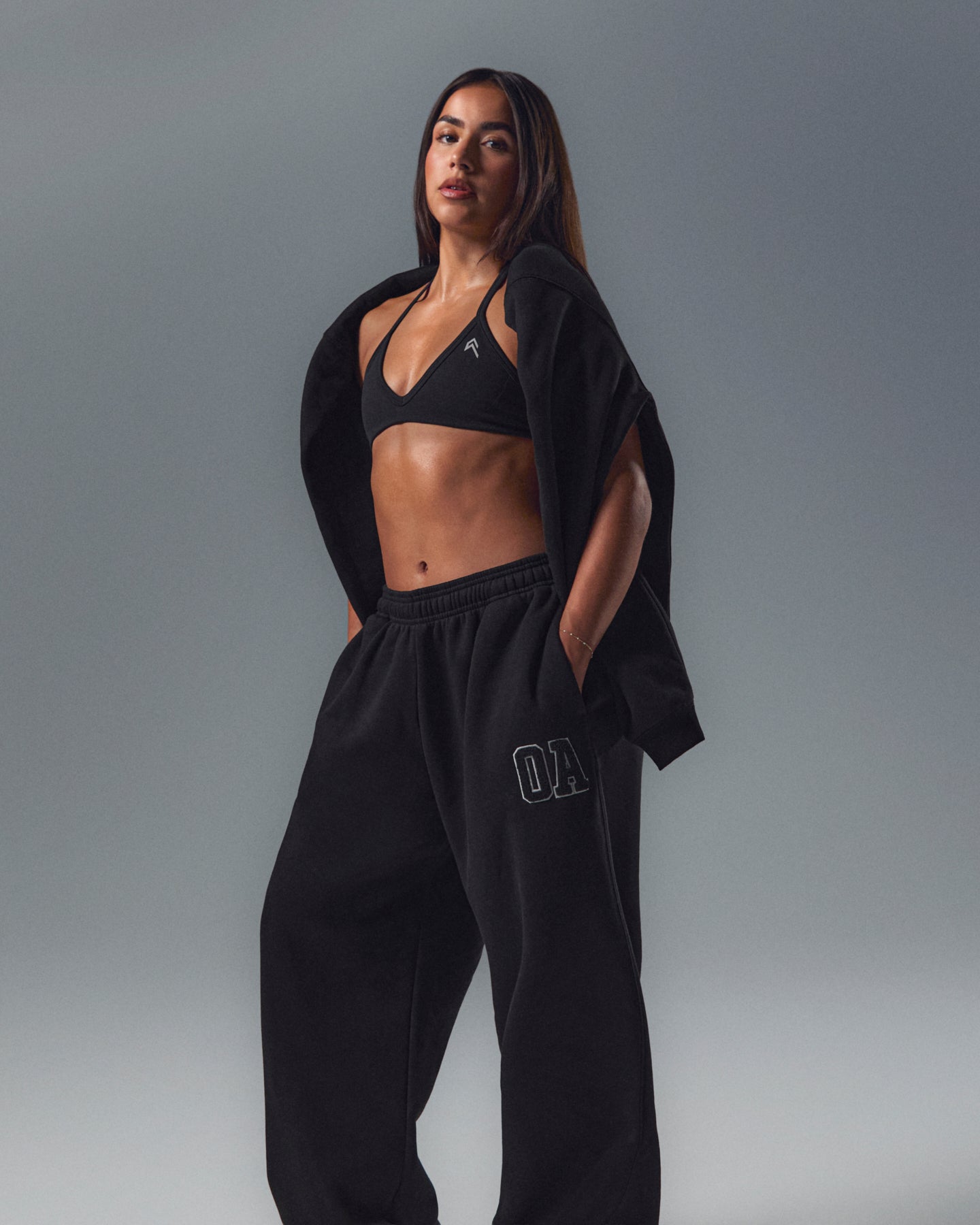 Alternative view of EnhanceLift Seamless Minimal Halter Neck Bralette with White Logo | Black