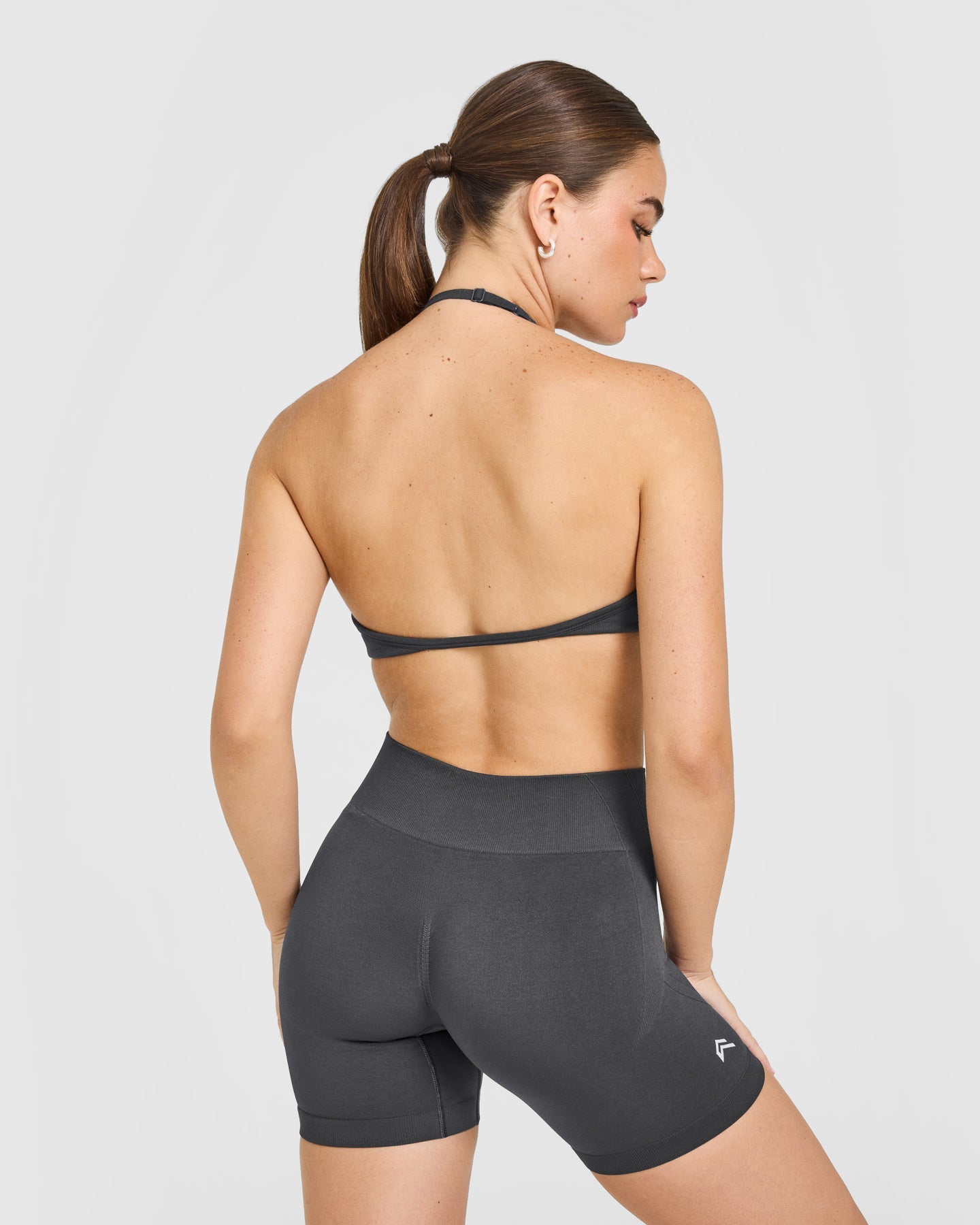 Alternative view of EnhanceLift Seamless Minimal Halter Neck Bralette with White Logo | Coal