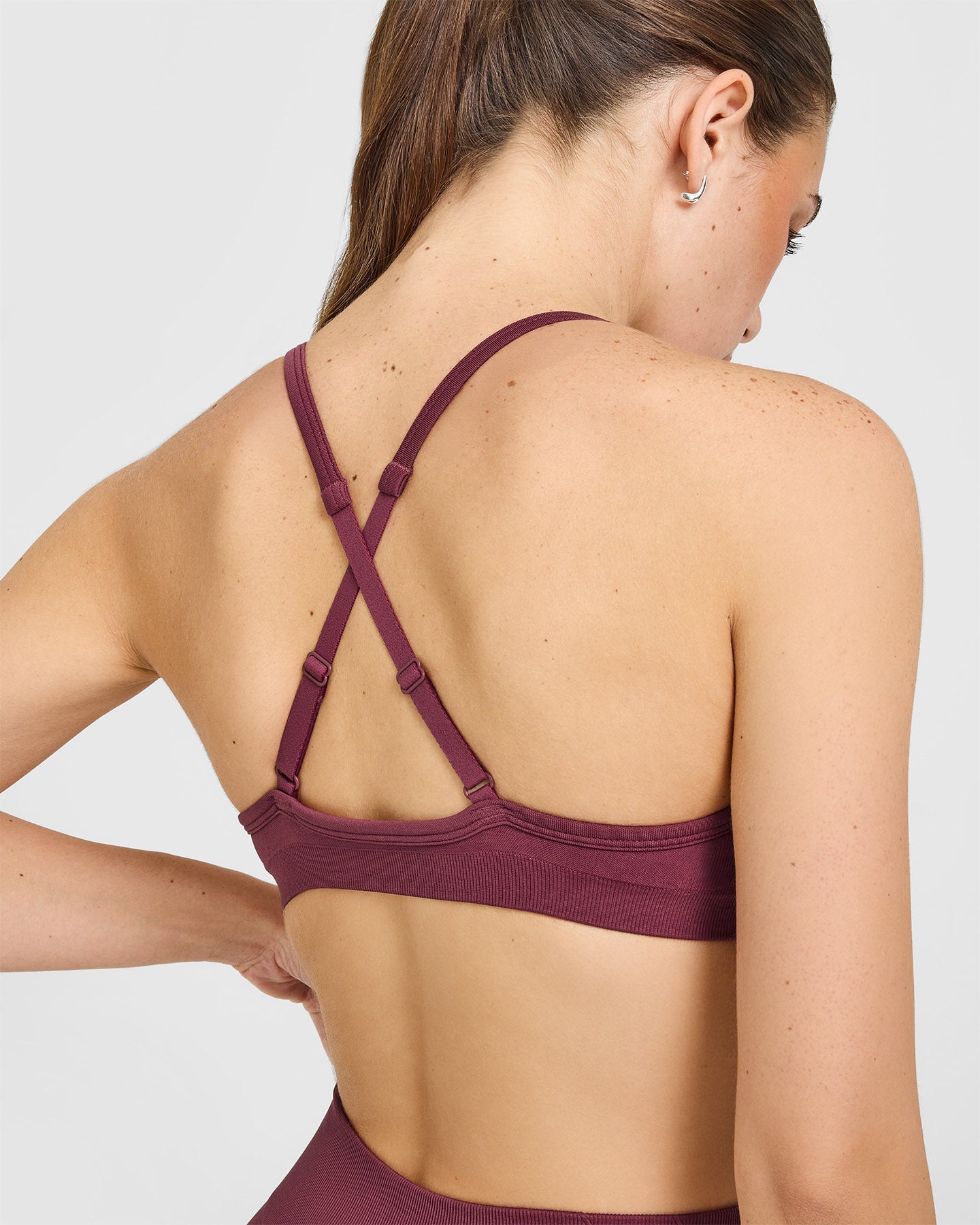 EnhanceLift Seamless Strappy Sports Bra with White Logo | Burnt Maroon - Image 4