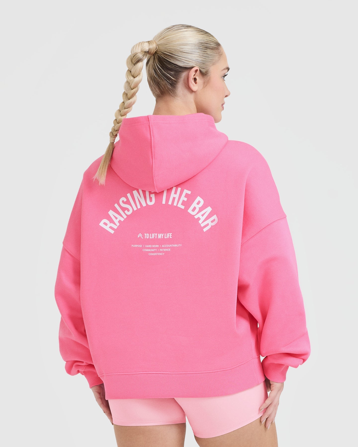 Alternative view of Raising the Bar Graphic Unisex Oversized Hoodie | Peony Pink