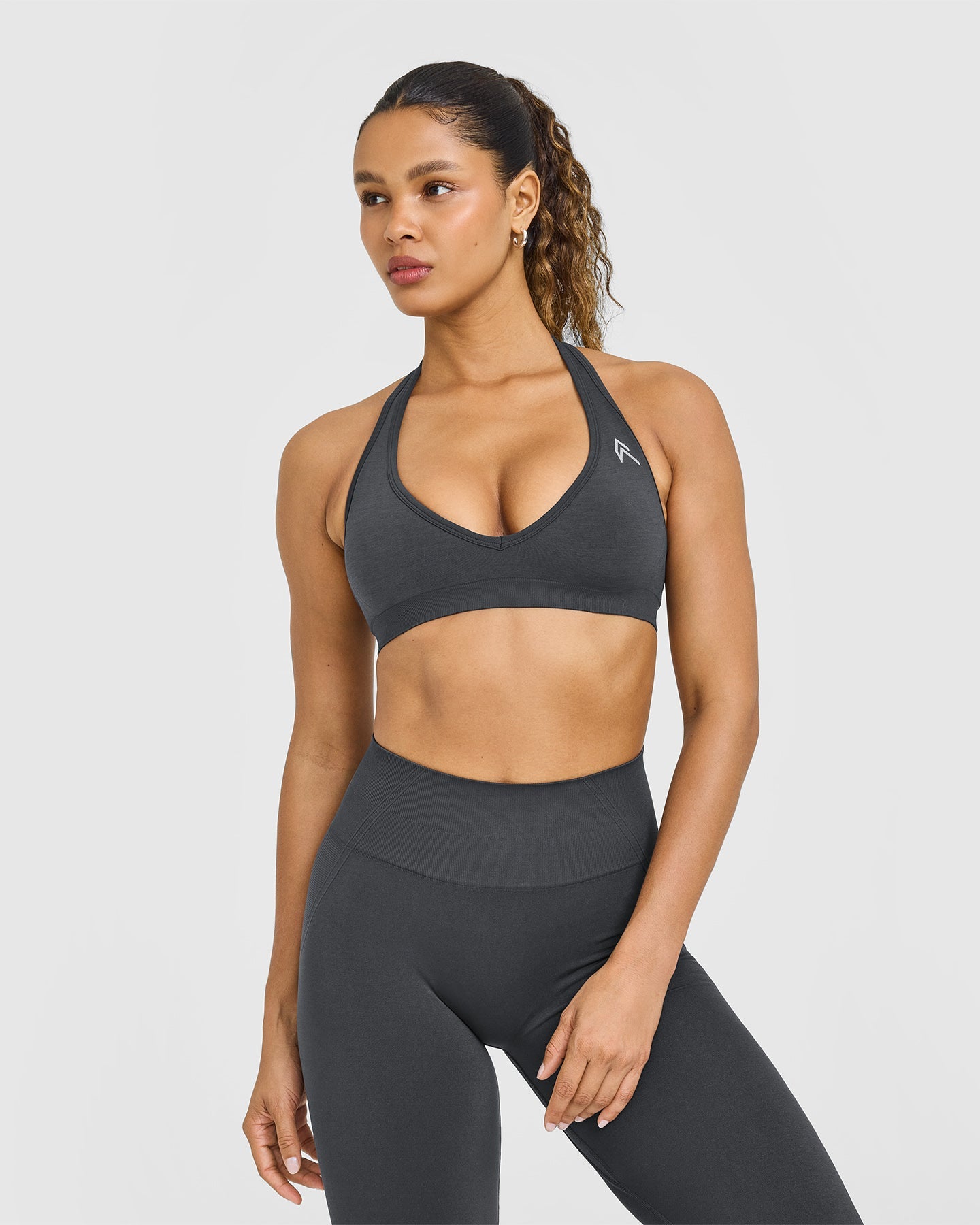 EffortlessLift Seamless Halter Neck Sports Bra with White Logo | Coal