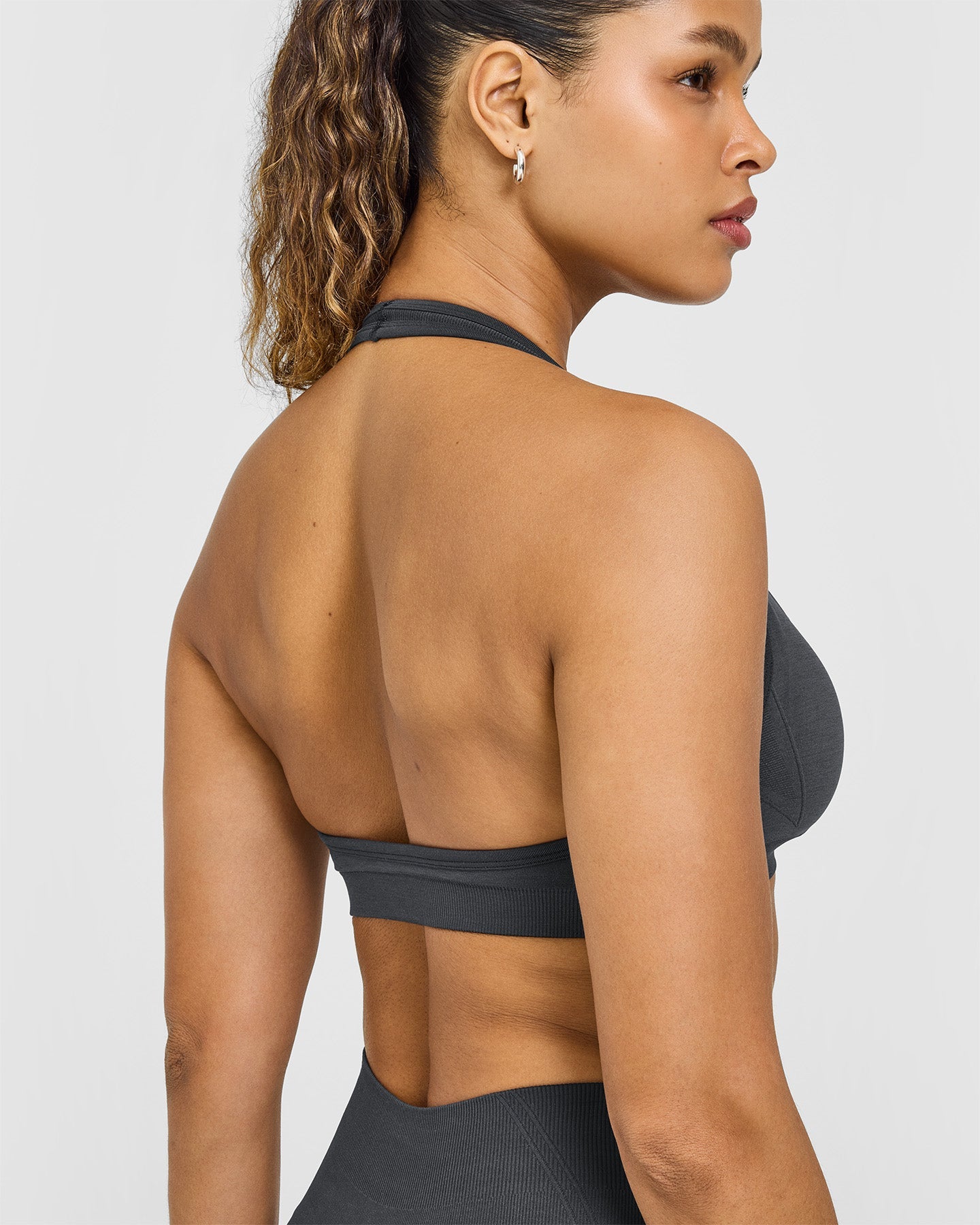 EffortlessLift Seamless Halter Neck Sports Bra with White Logo | Coal - Image 6