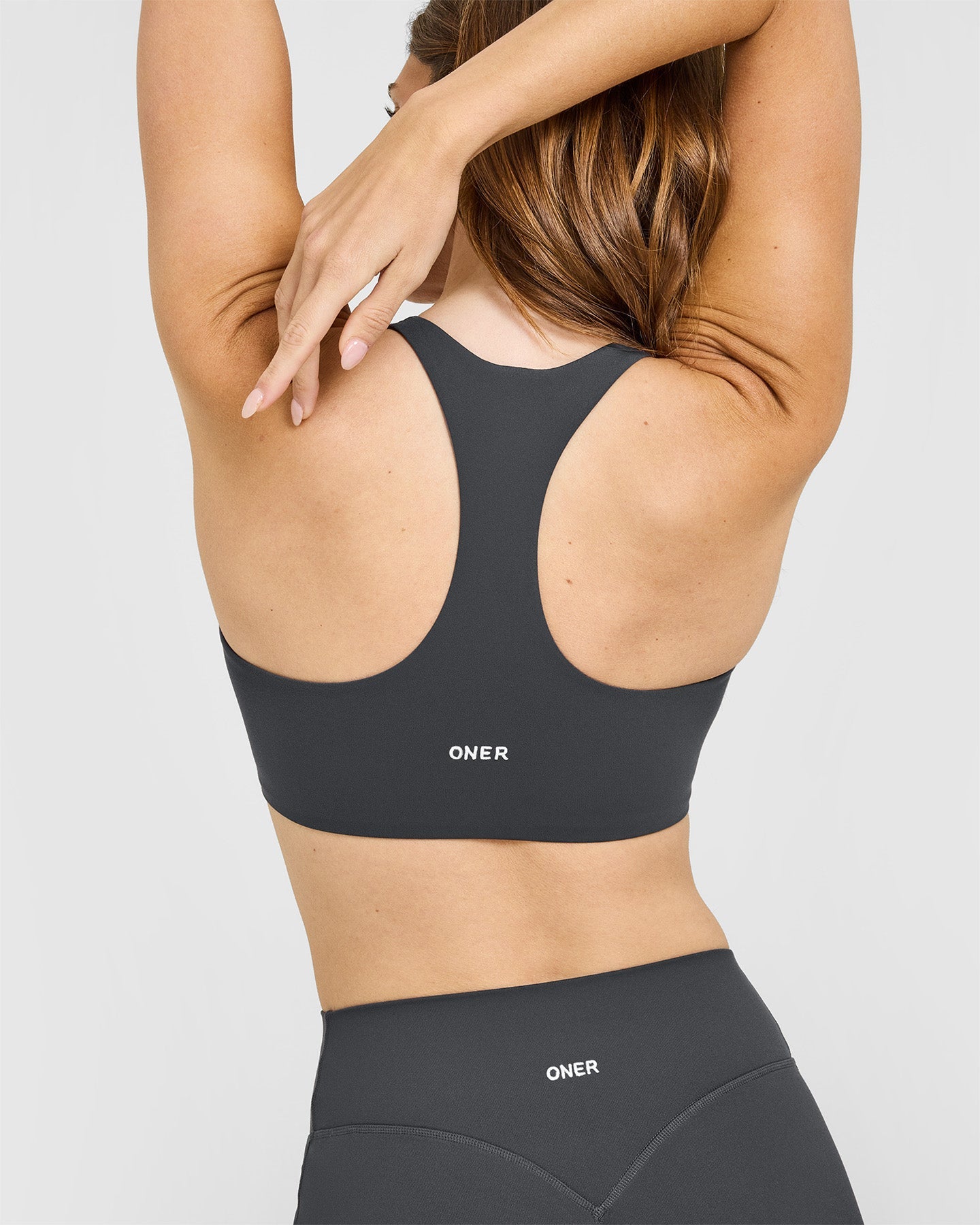 Alternative view of SoftMotion Sports Bra with White Logo | Coal
