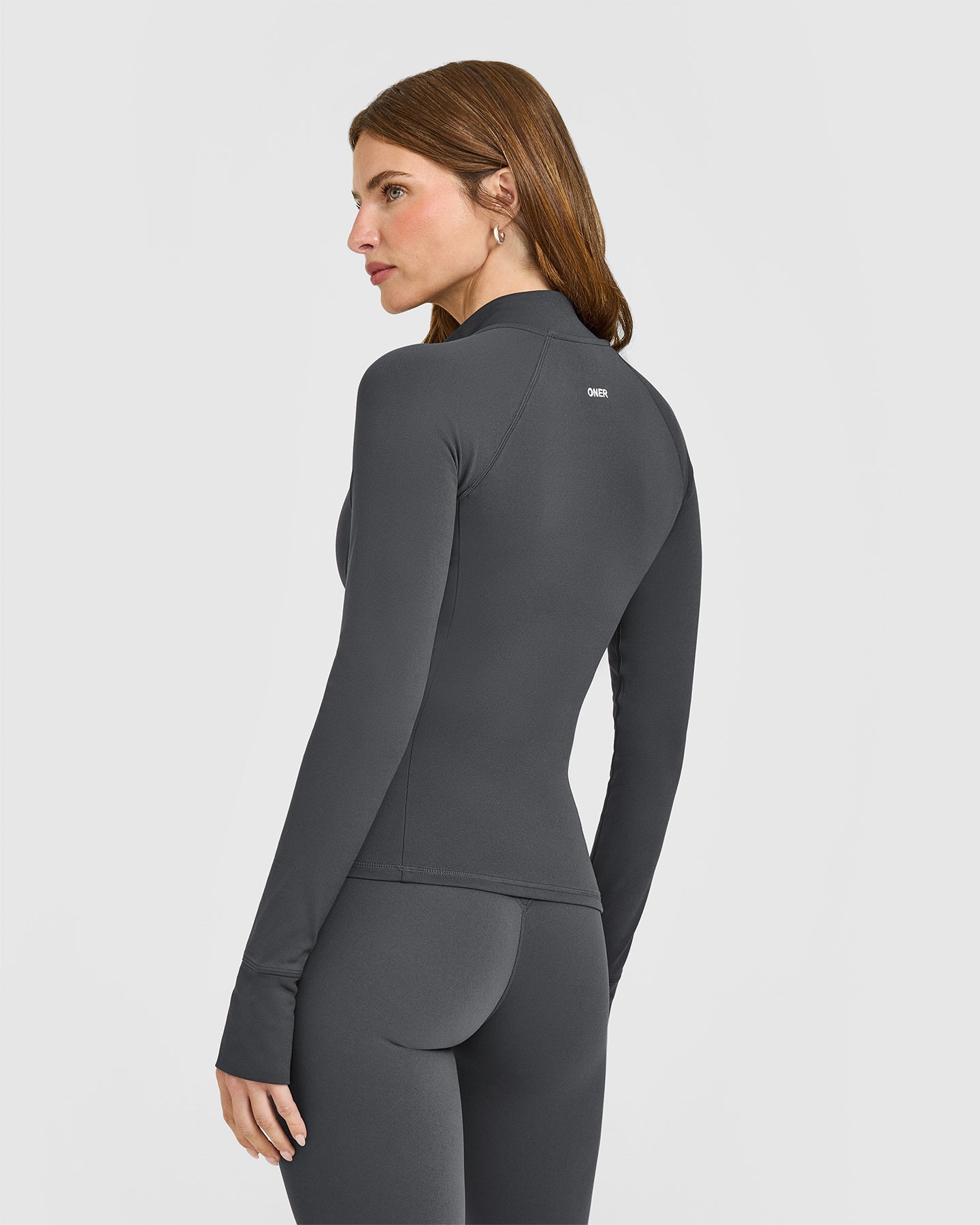 Alternative view of SoftMotion Jacket with White Logo | Coal