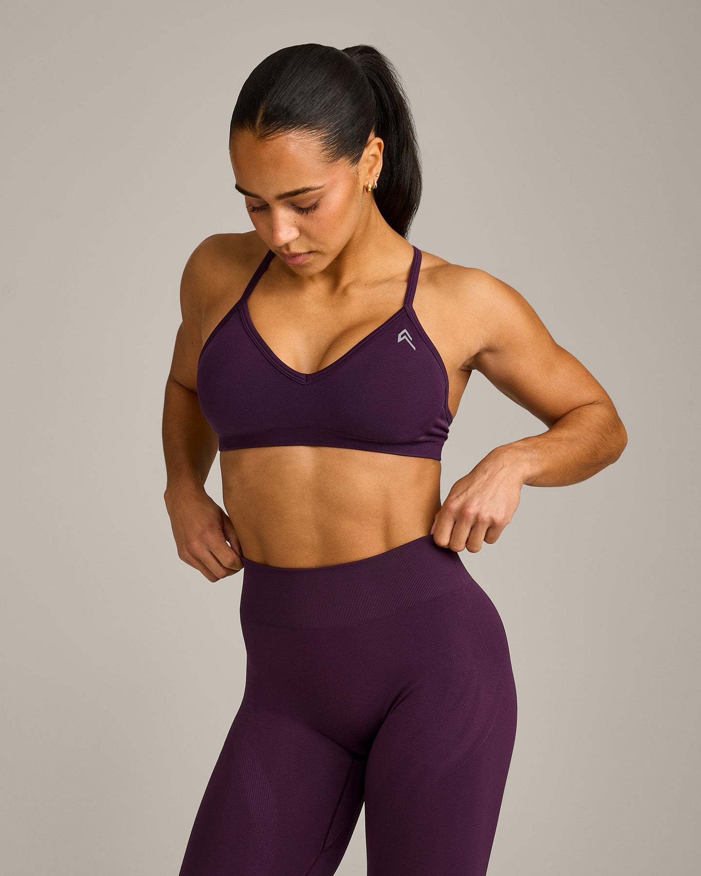 EnhanceLift Seamless Strappy Sports Bra with Grey Logo | Blackberry Purple