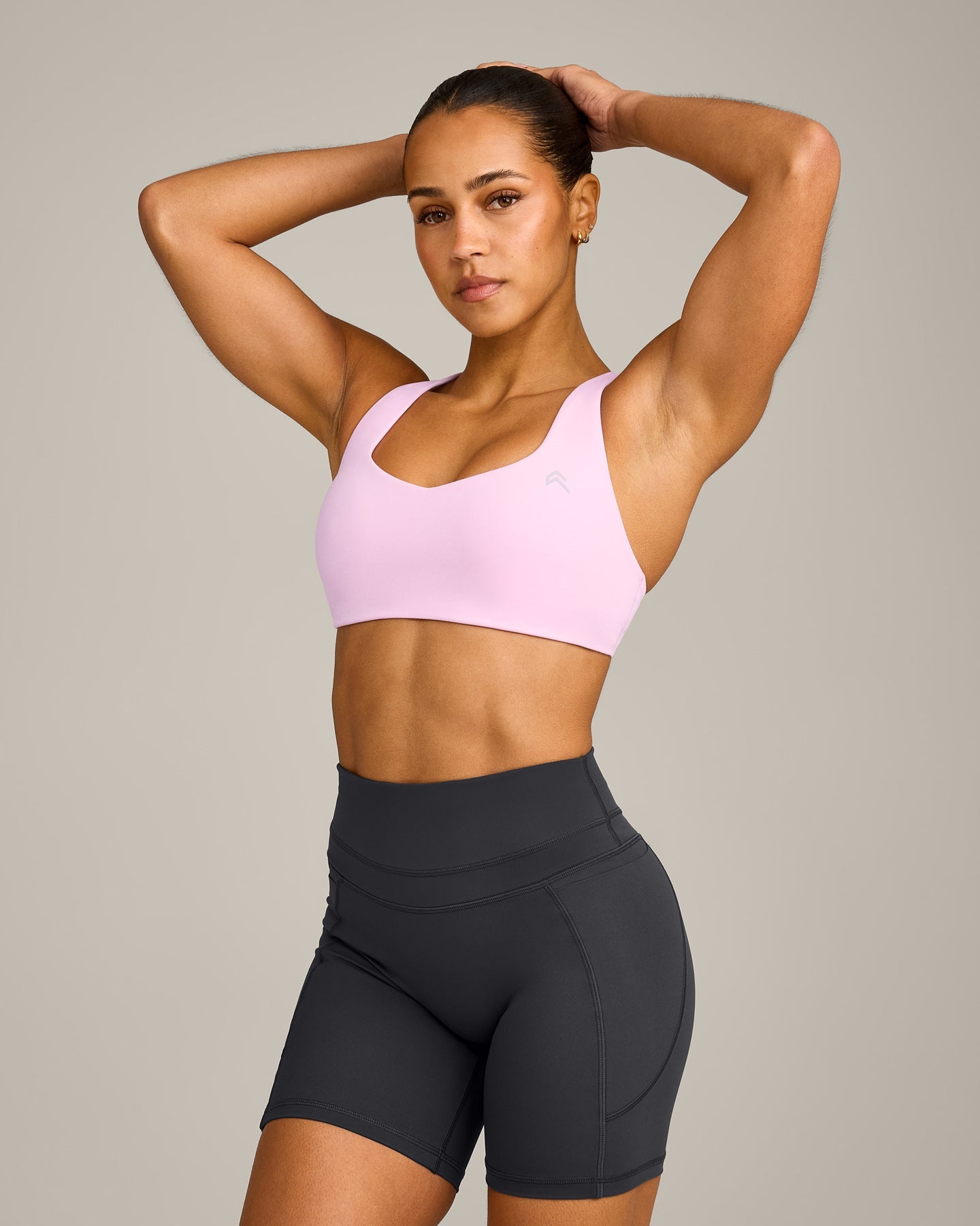 EasyLift Cross Back Sports Bra with Grey Logo | Chalk Pink