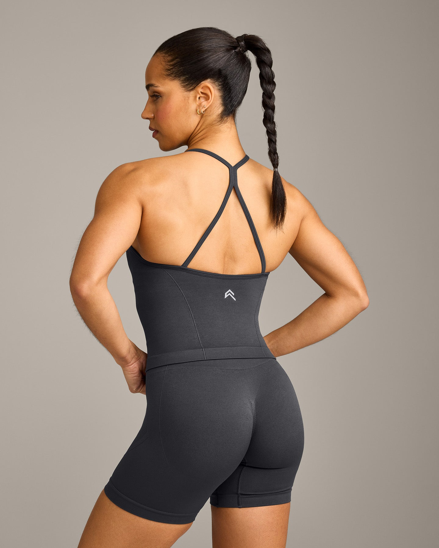 Alternative view of EnhanceLift Seamless Strappy Racer Vest with Built in Bra Shelf with Grey Logo | Coal