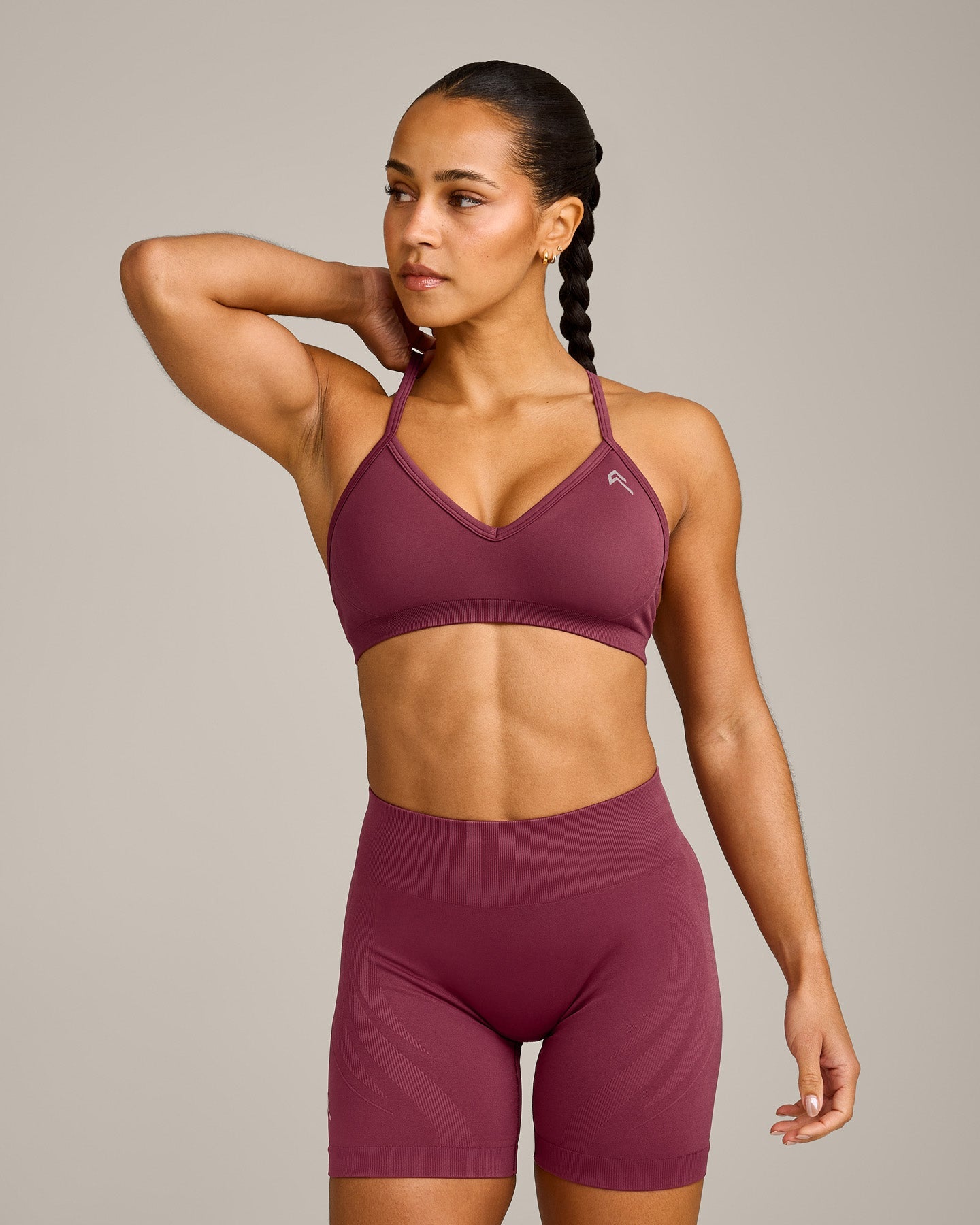 EnhanceLift Seamless Strappy Sports Bra with Grey Logo | Burnt Maroon