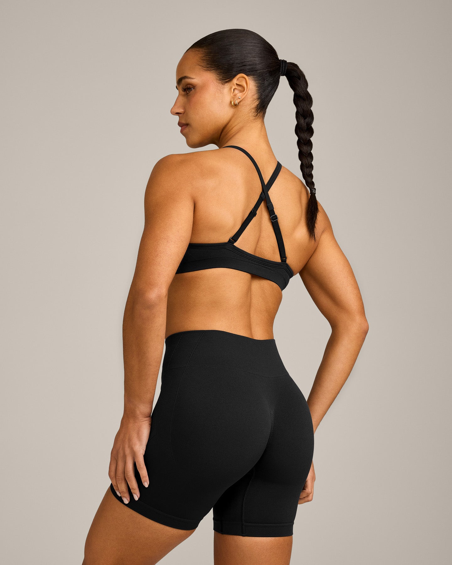 EnhanceLift Seamless Strappy Sports Bra with Grey Logo | Black - Image 5