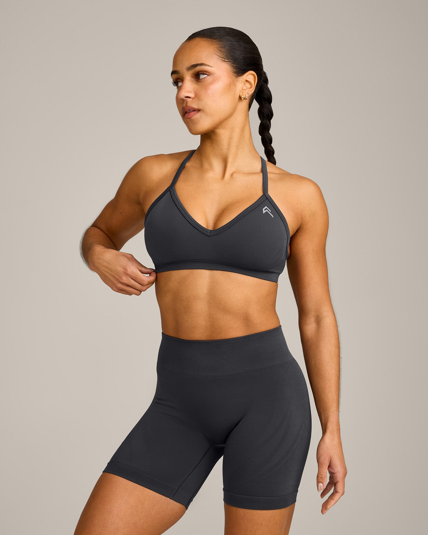 EnhanceLift Seamless Strappy Sports Bra with Grey Logo | Coal
