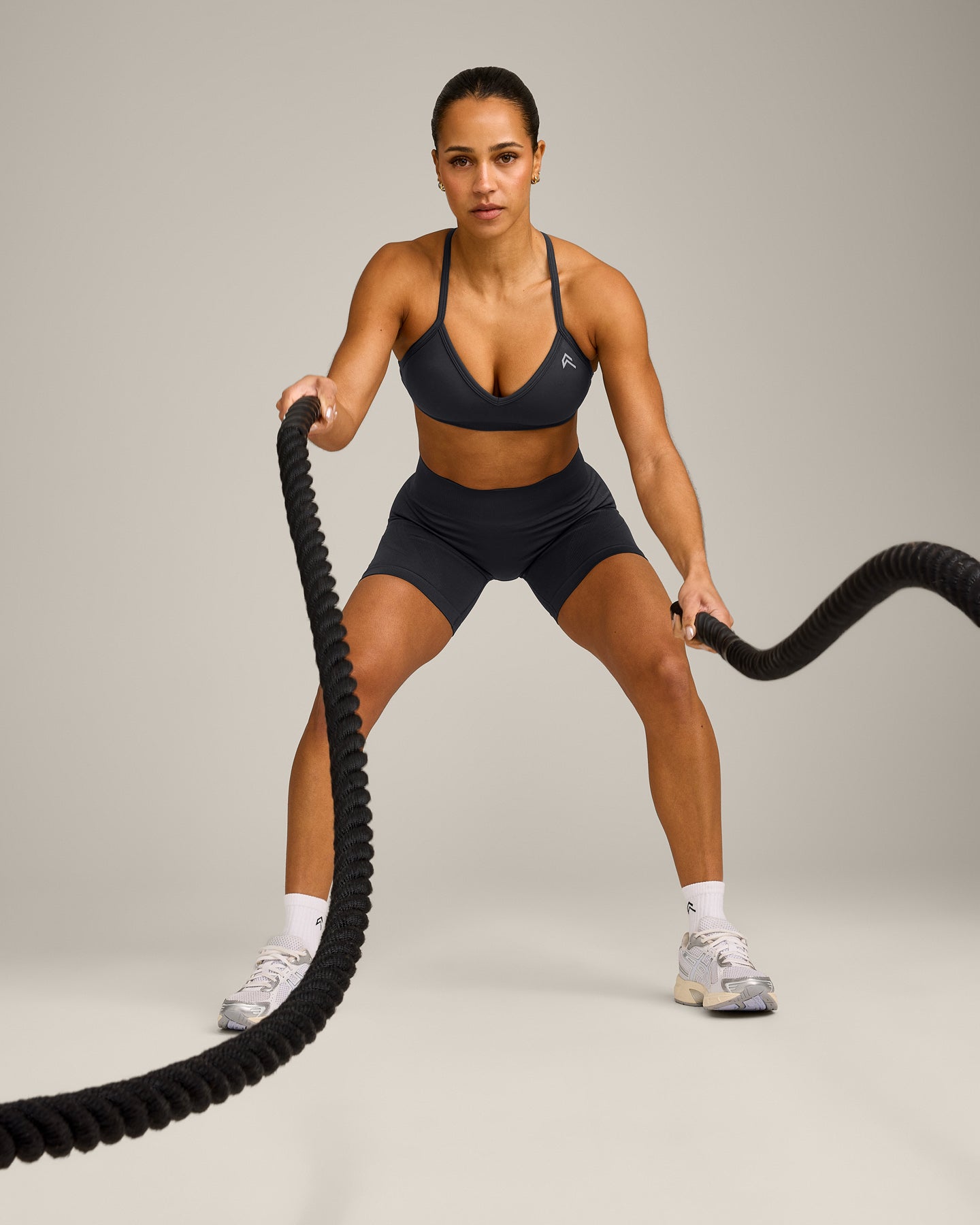 EnhanceLift Seamless Strappy Sports Bra with Grey Logo | Coal - Image 3