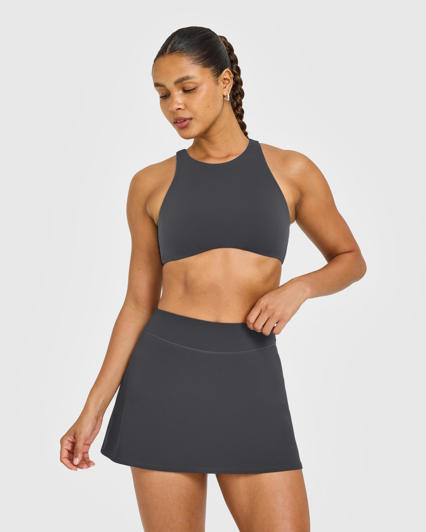 SoftMotion High Neck Sports Bra with White Logo | Coal