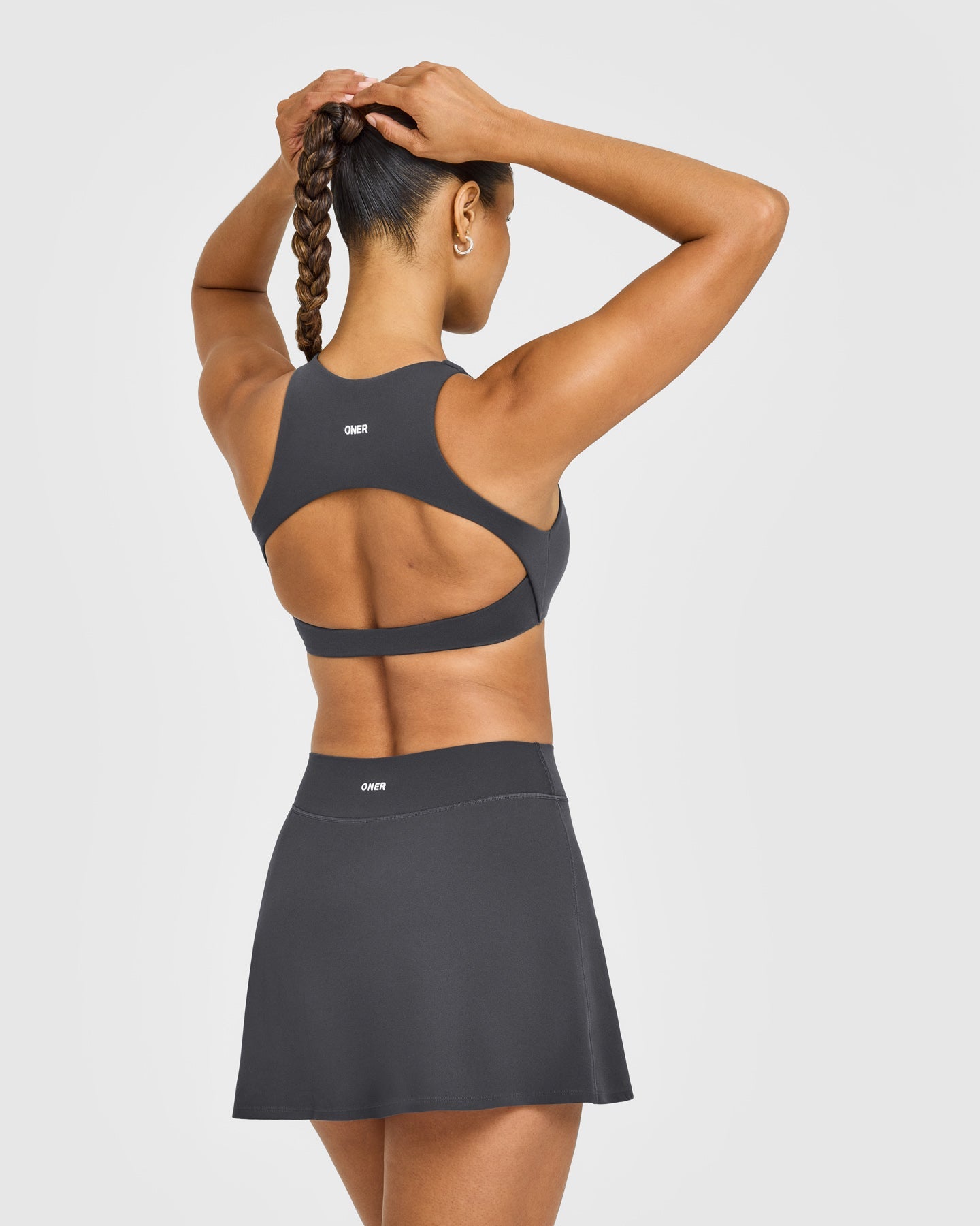 Alternative view of SoftMotion High Neck Sports Bra with White Logo | Coal