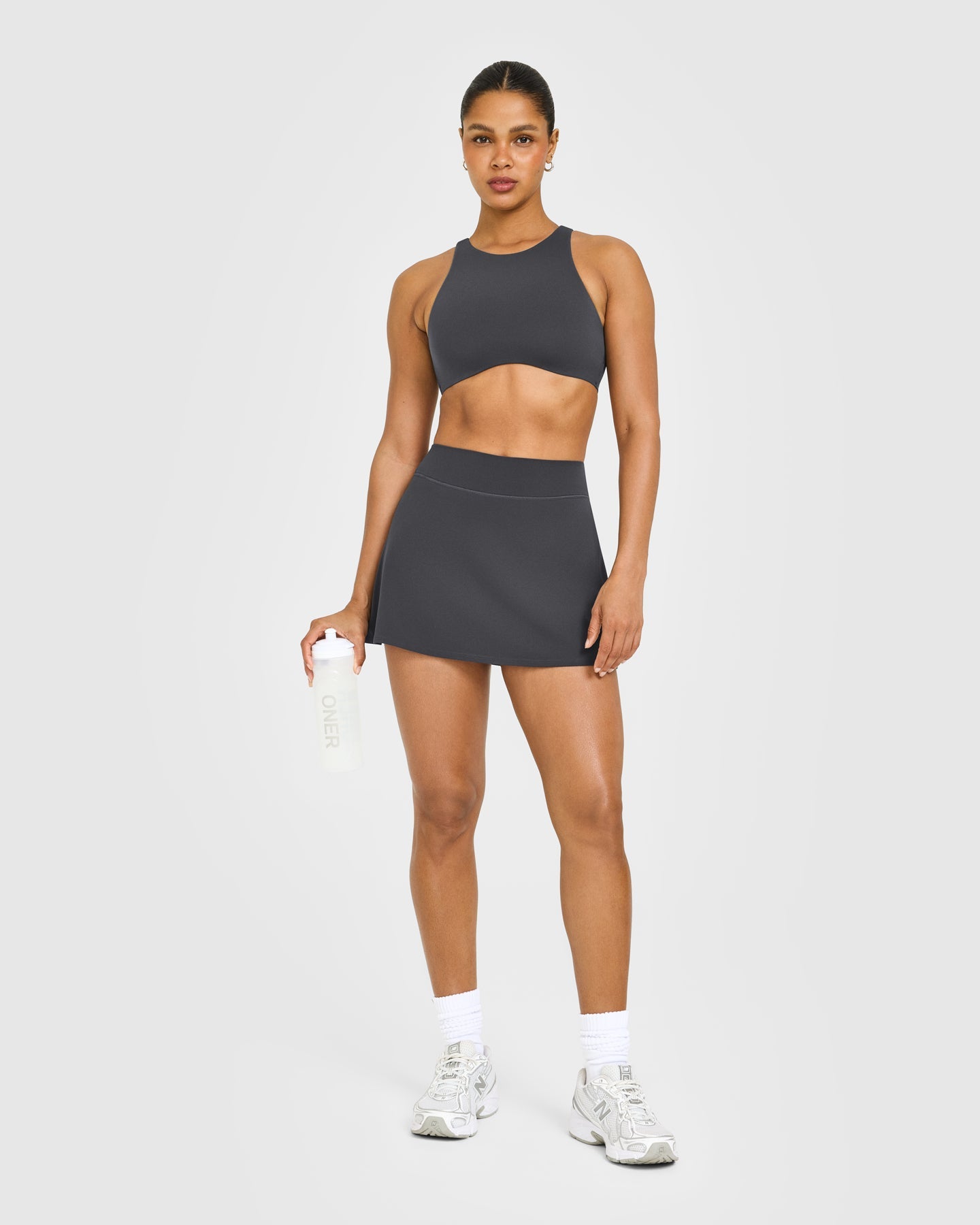 SoftMotion High Neck Sports Bra with White Logo | Coal - Image 3