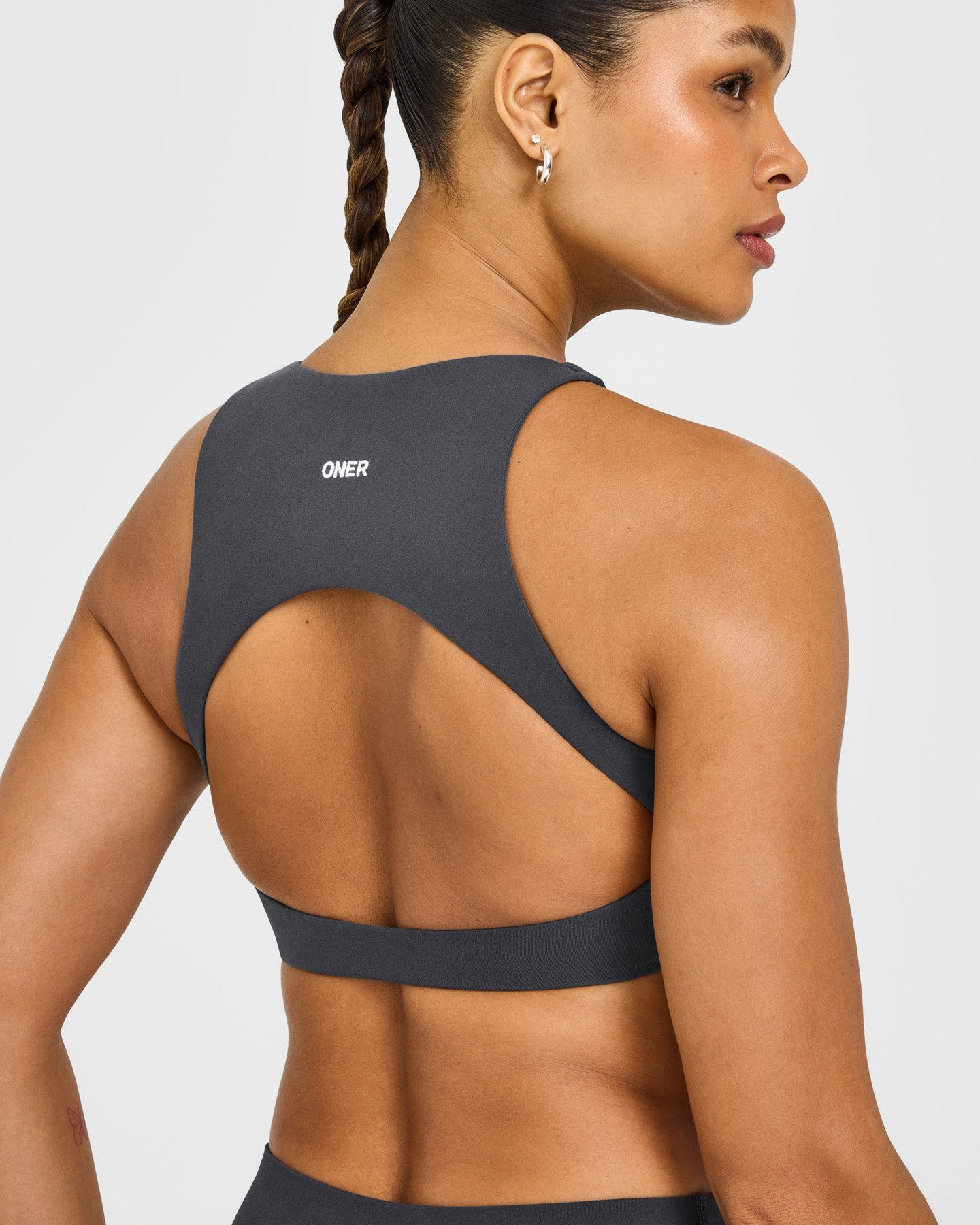 SoftMotion High Neck Sports Bra with White Logo | Coal - Image 4