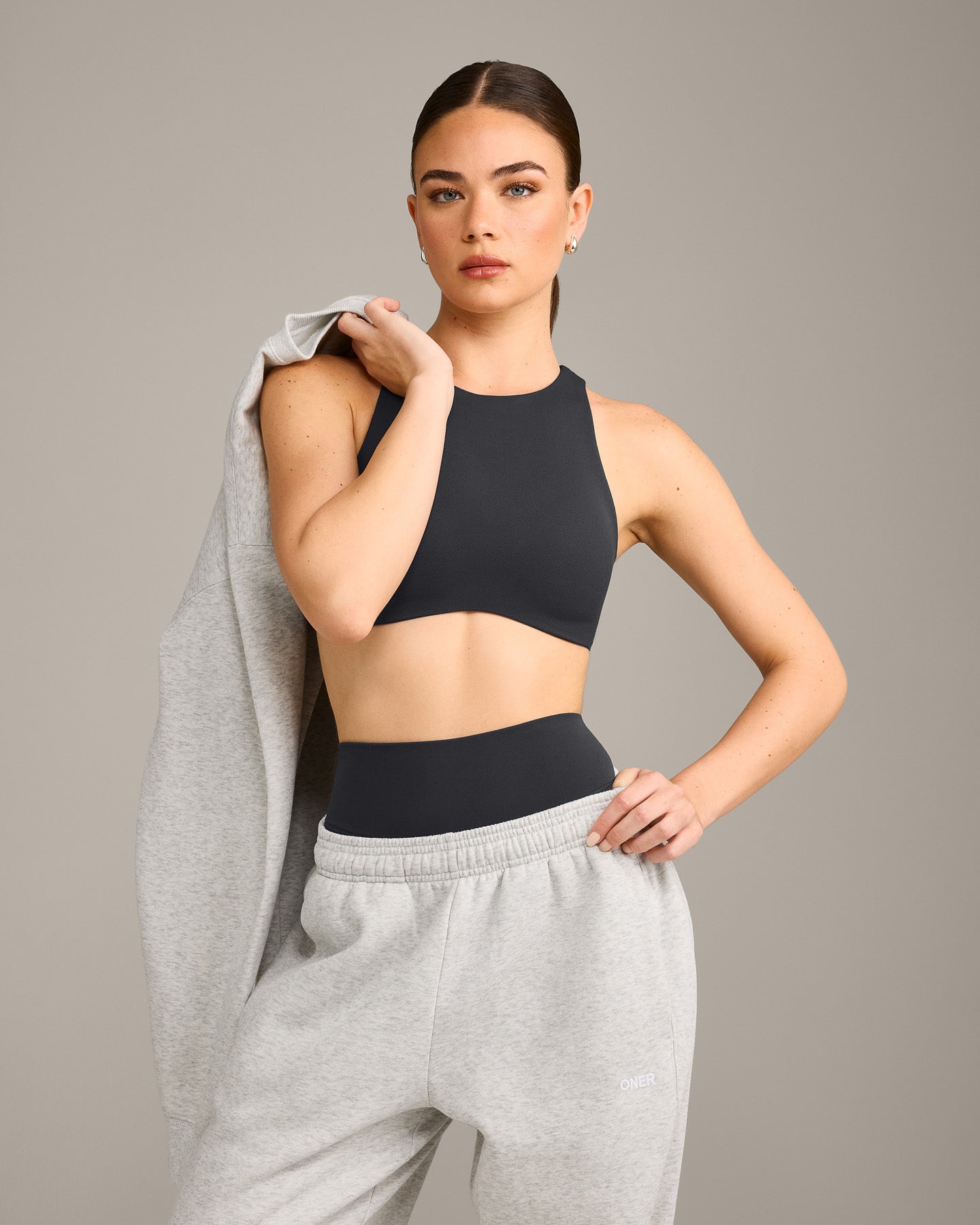 SoftMotion High Neck Sports Bra with Grey Logo | Coal