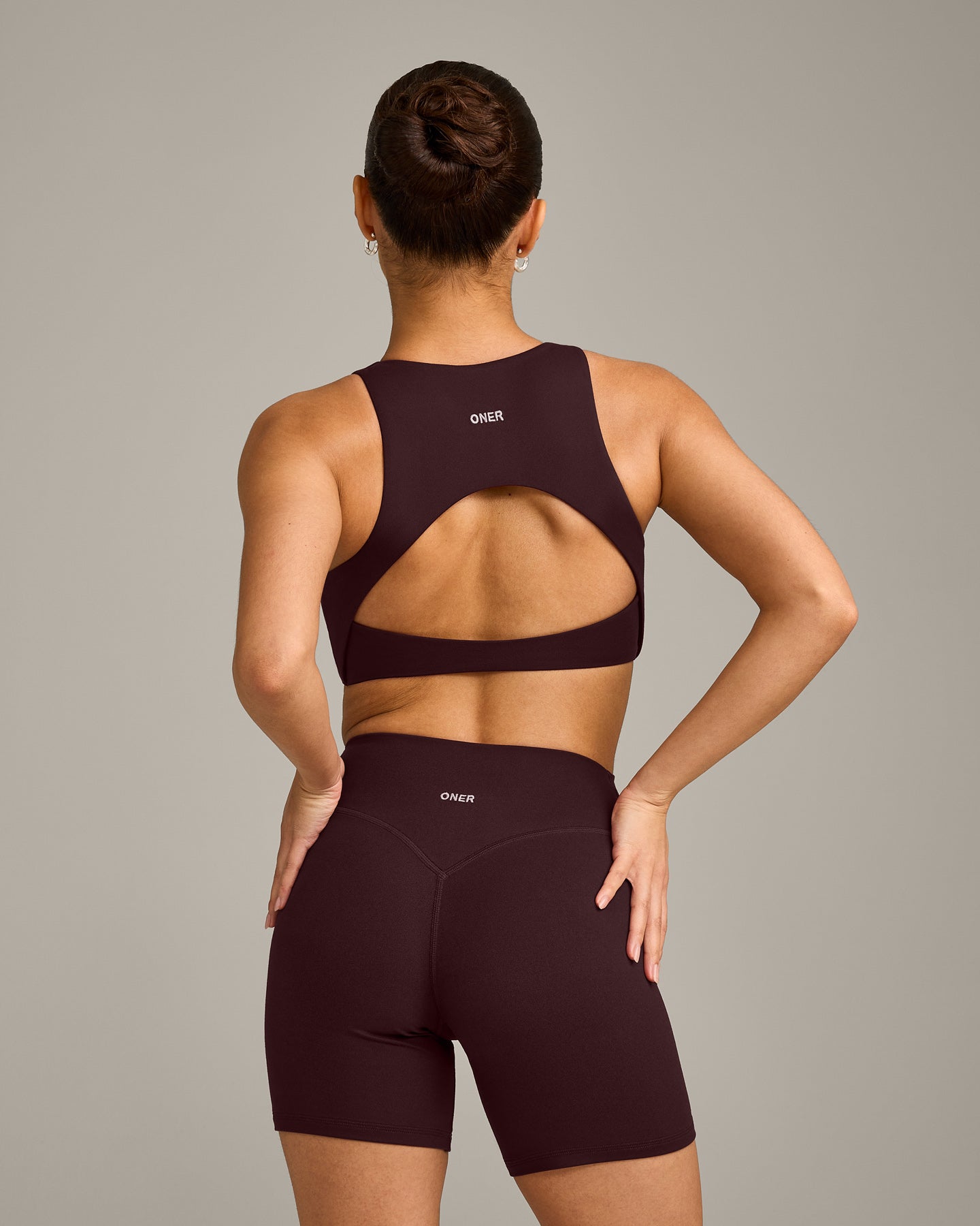 Alternative view of SoftMotion High Neck Sports Bra with Grey Logo | Plum Brown