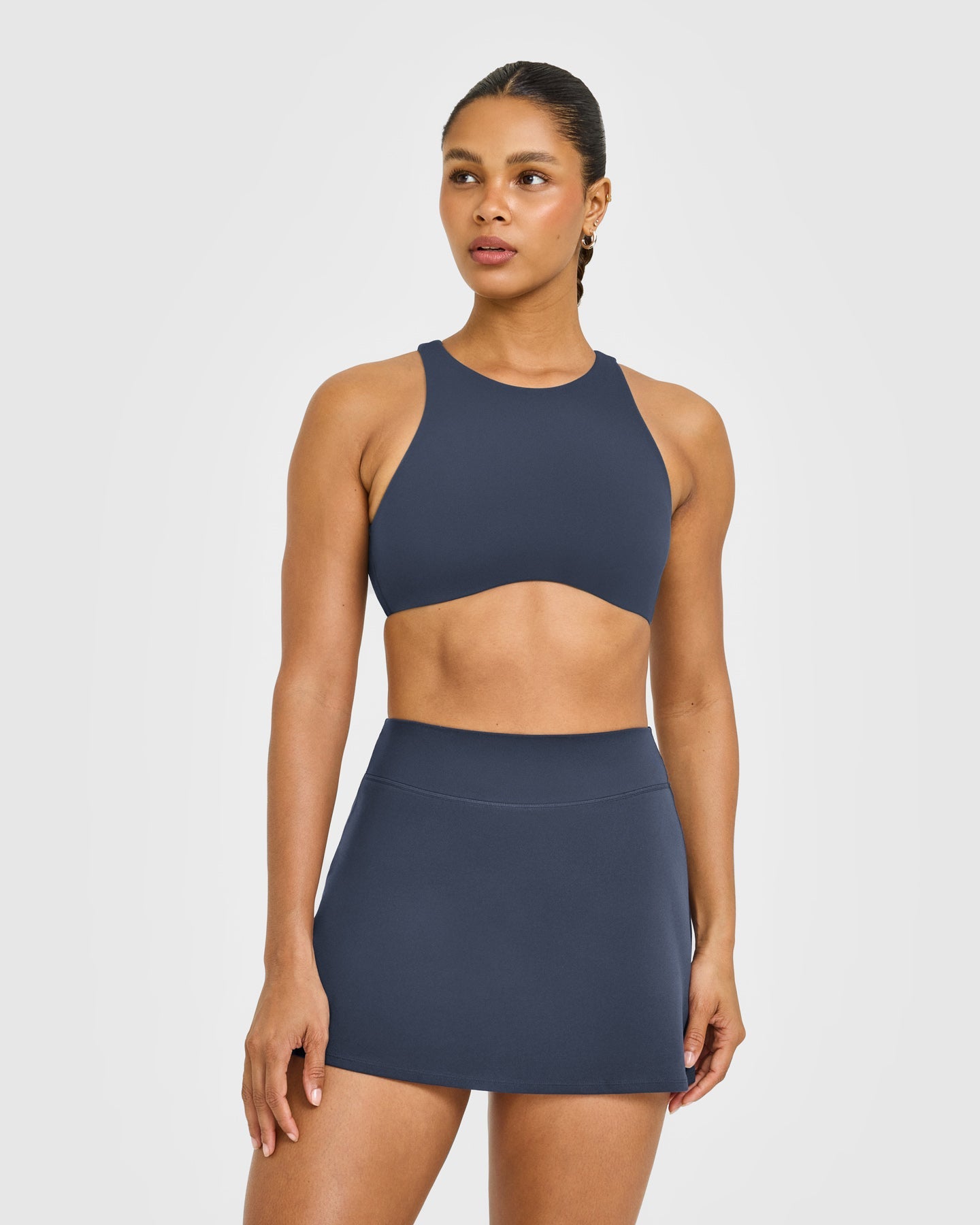 SoftMotion High Neck Sports Bra with White Logo | True Blue