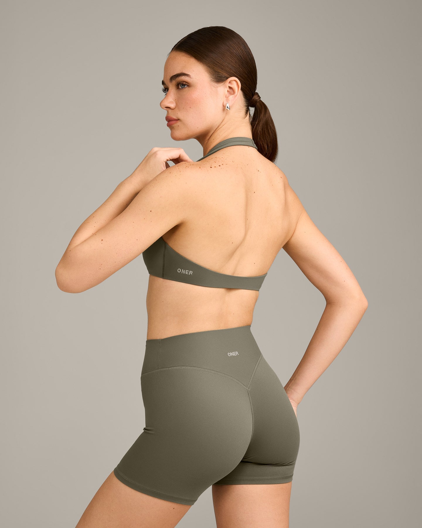 SoftMotion Minimal Halter Neck Bralette with Grey Logo | Alpine Green - Image 6