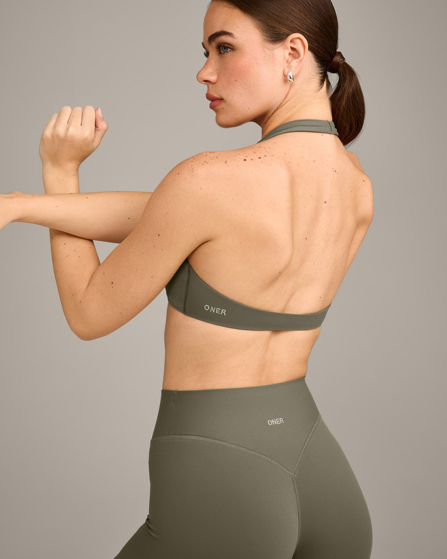 Alternative view of SoftMotion Minimal Halter Neck Bralette with Grey Logo | Alpine Green