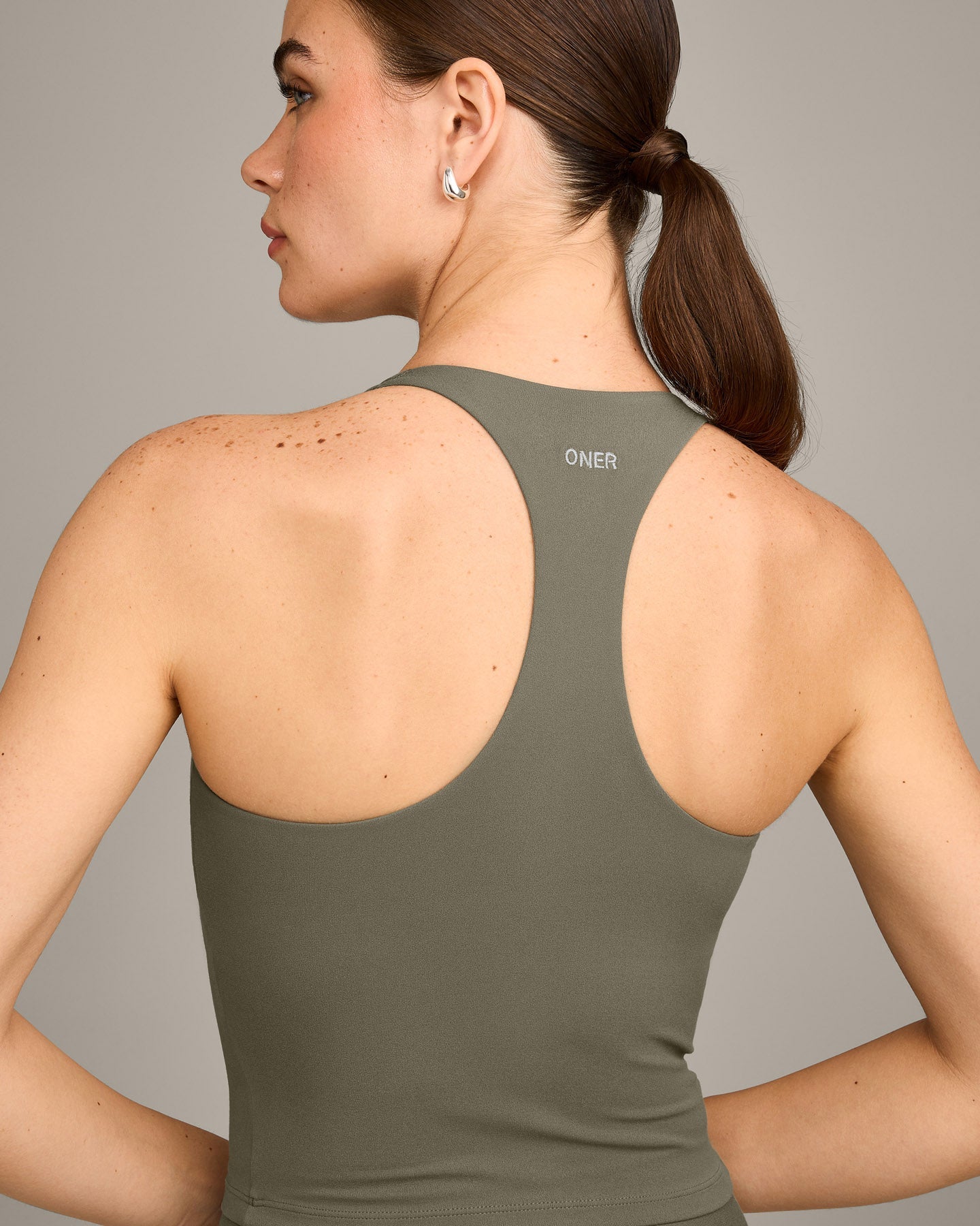 SoftMotion Racer Back Mid Vest with Built in Bra Shelf with Grey Logo | Alpine Green - Image 4