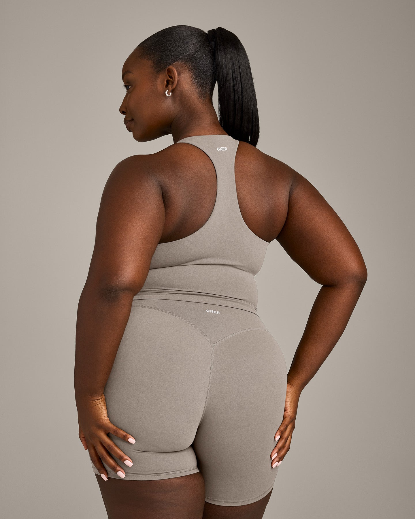 SoftMotion Racer Back Mid Vest with Built in Bra Shelf with White Logo | Warm Sand - Image 6