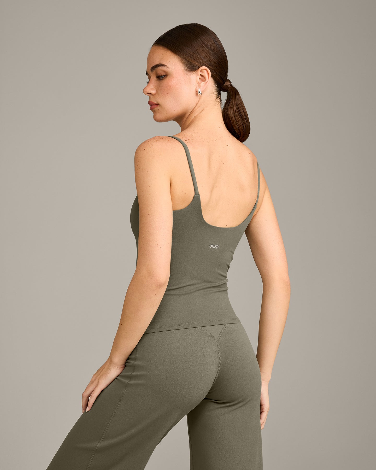 Alternative view of SoftMotion Strappy Vest with Built in Bra Shelf with Grey Logo | Alpine Green