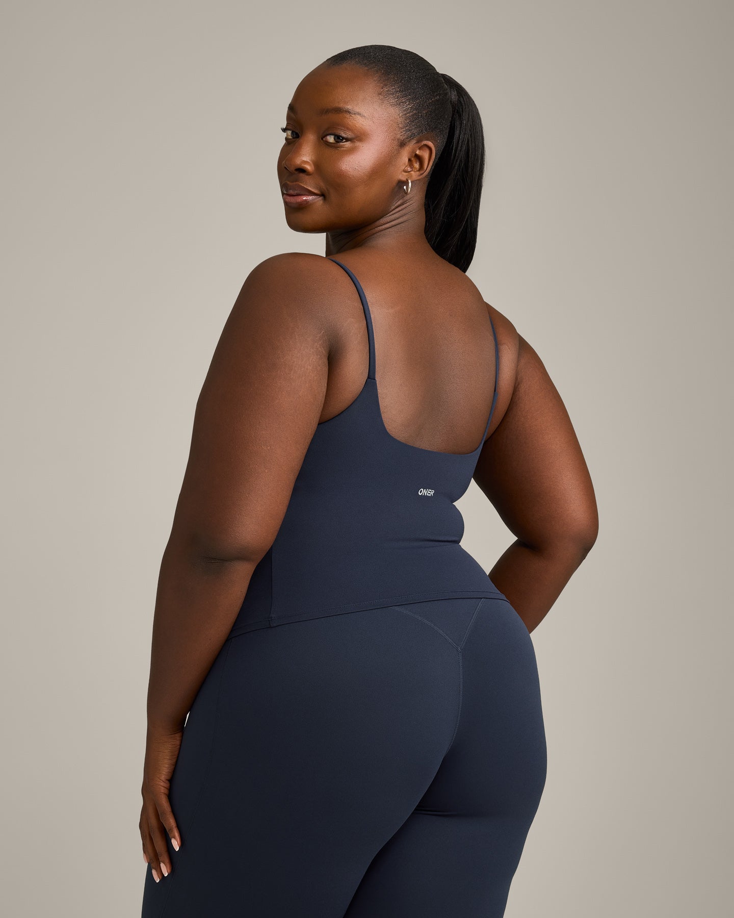 Alternative view of SoftMotion Strappy Mid Vest with Built in Bra Shelf with Grey Logo | True Blue
