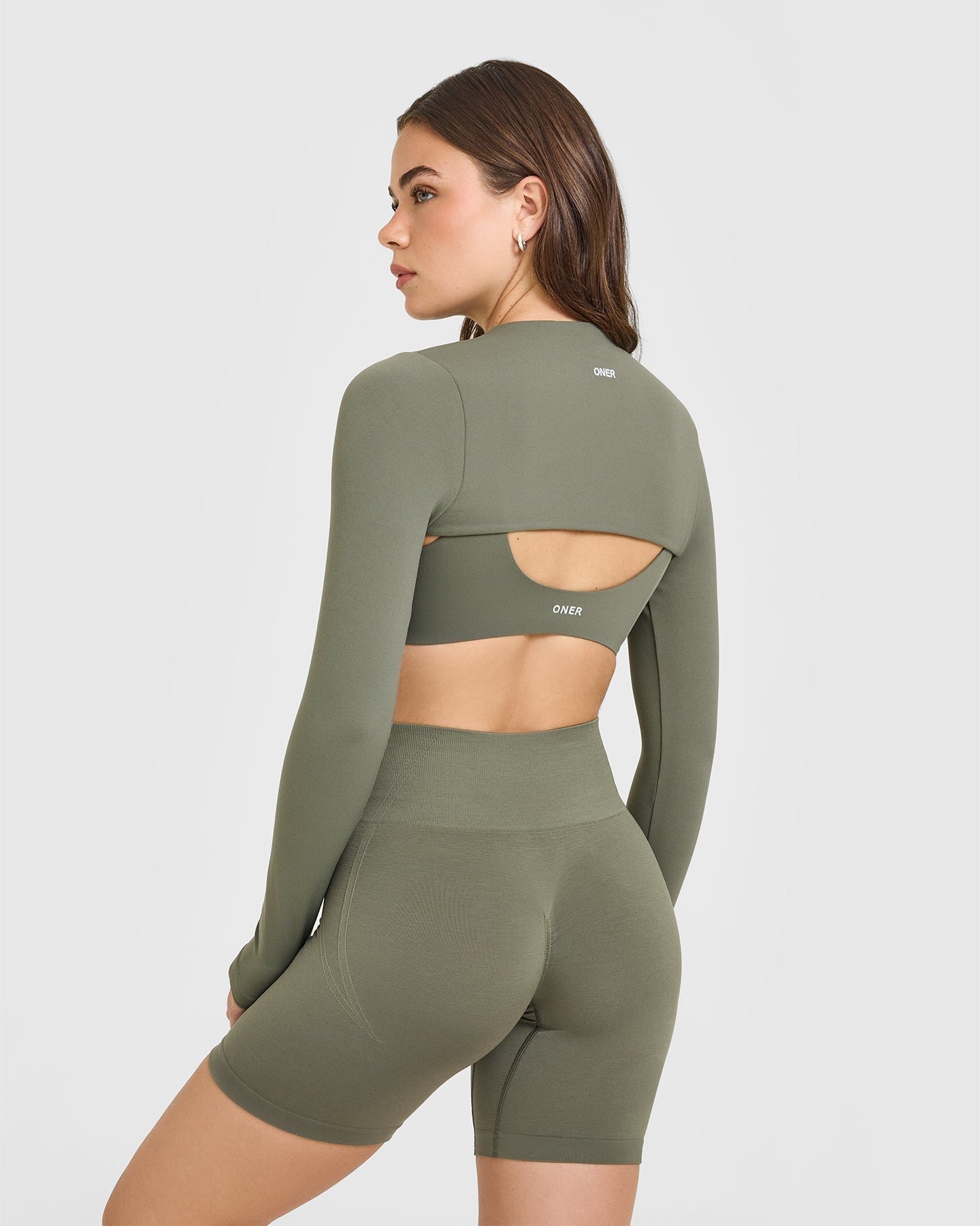Alternative view of SoftMotion Shrug Cover with White Logo | Alpine Green