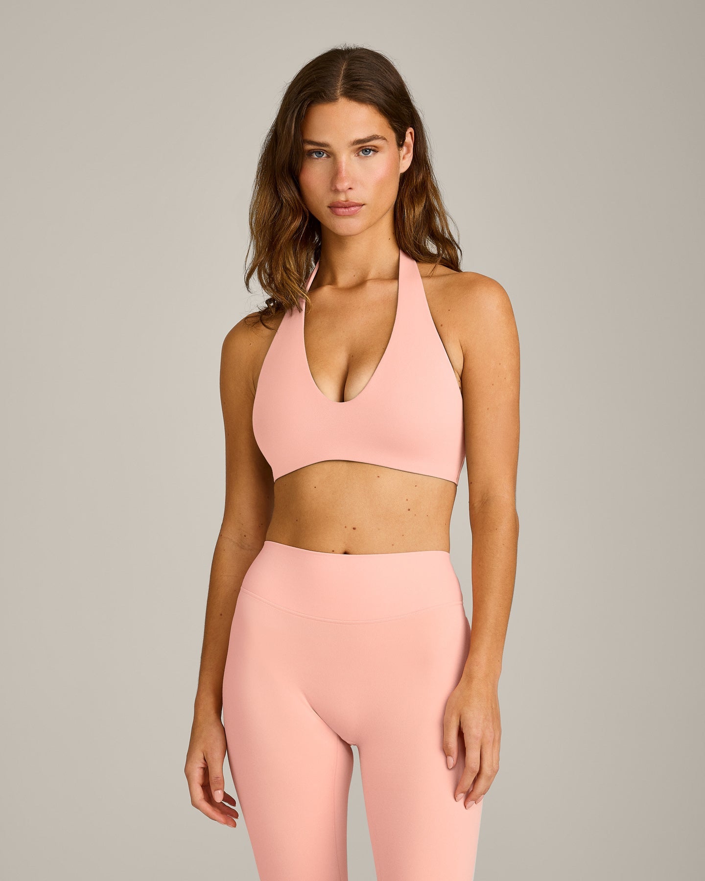 SoftMotion Minimal Halter Neck Bralette with Grey Logo | Peach Orange