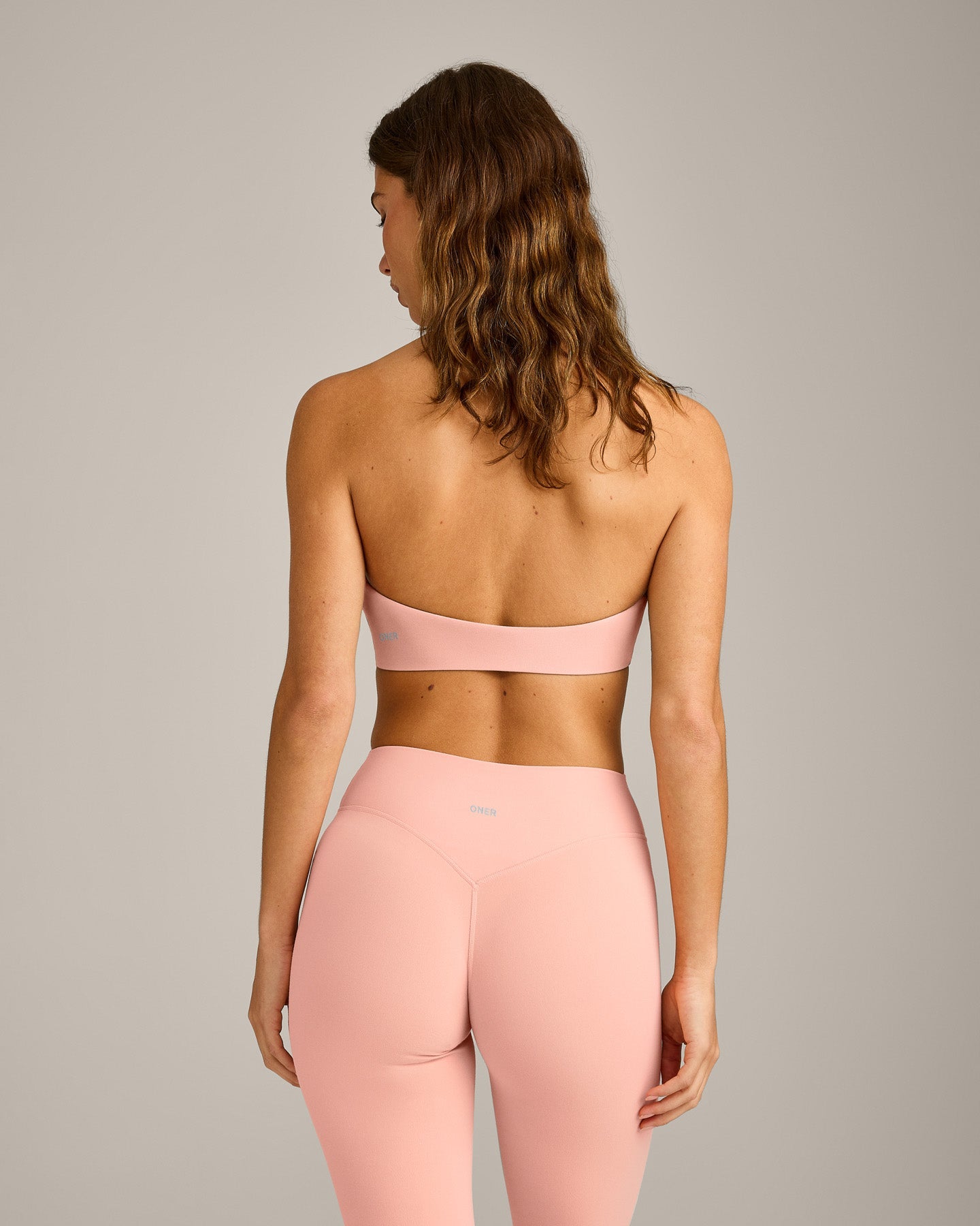 Alternative view of SoftMotion Minimal Halter Neck Bralette with Grey Logo | Peach Orange
