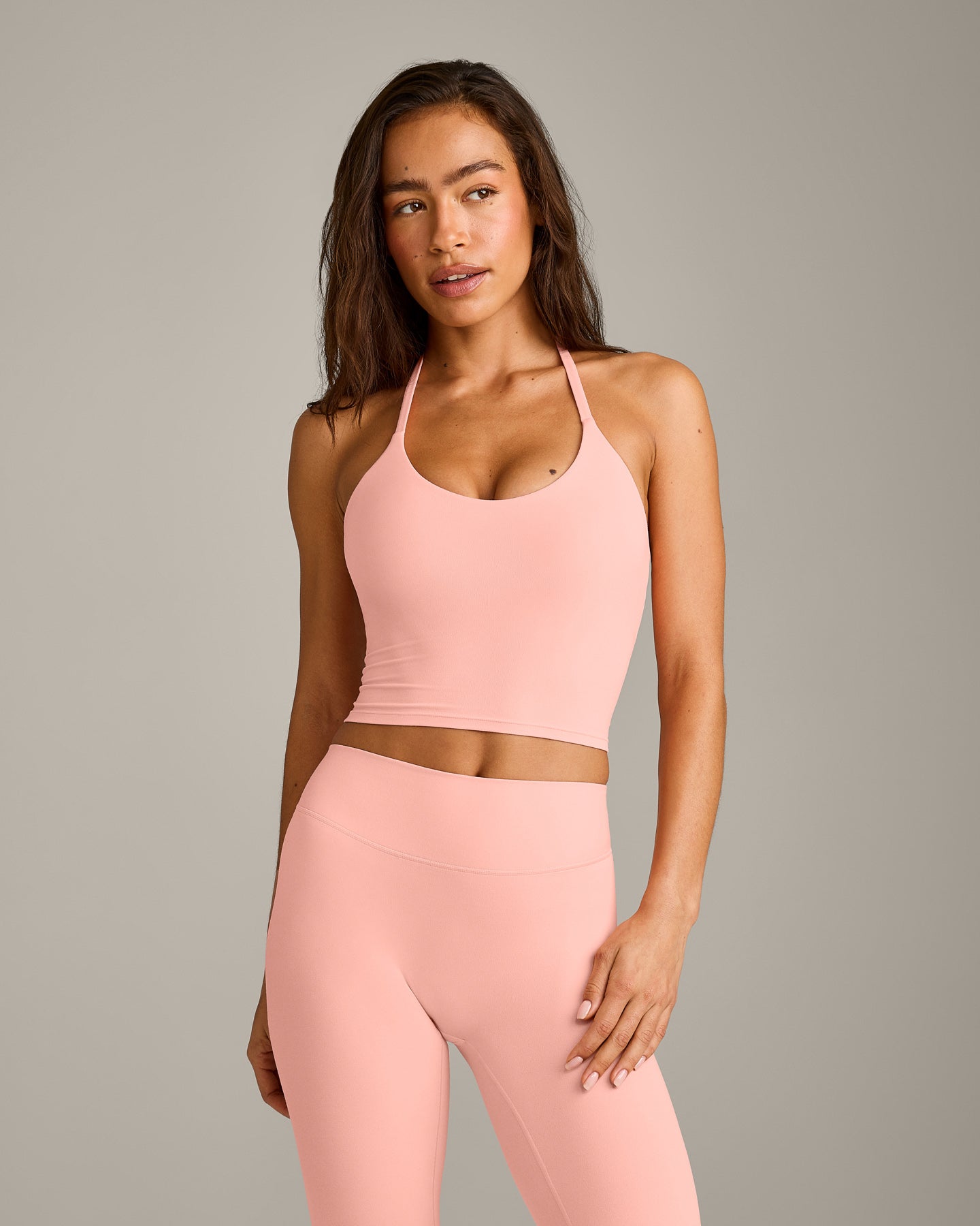 SoftMotion Strappy Halter Neck Mid Vest with Built in Bra Shelf with Grey Logo | Peach Orange