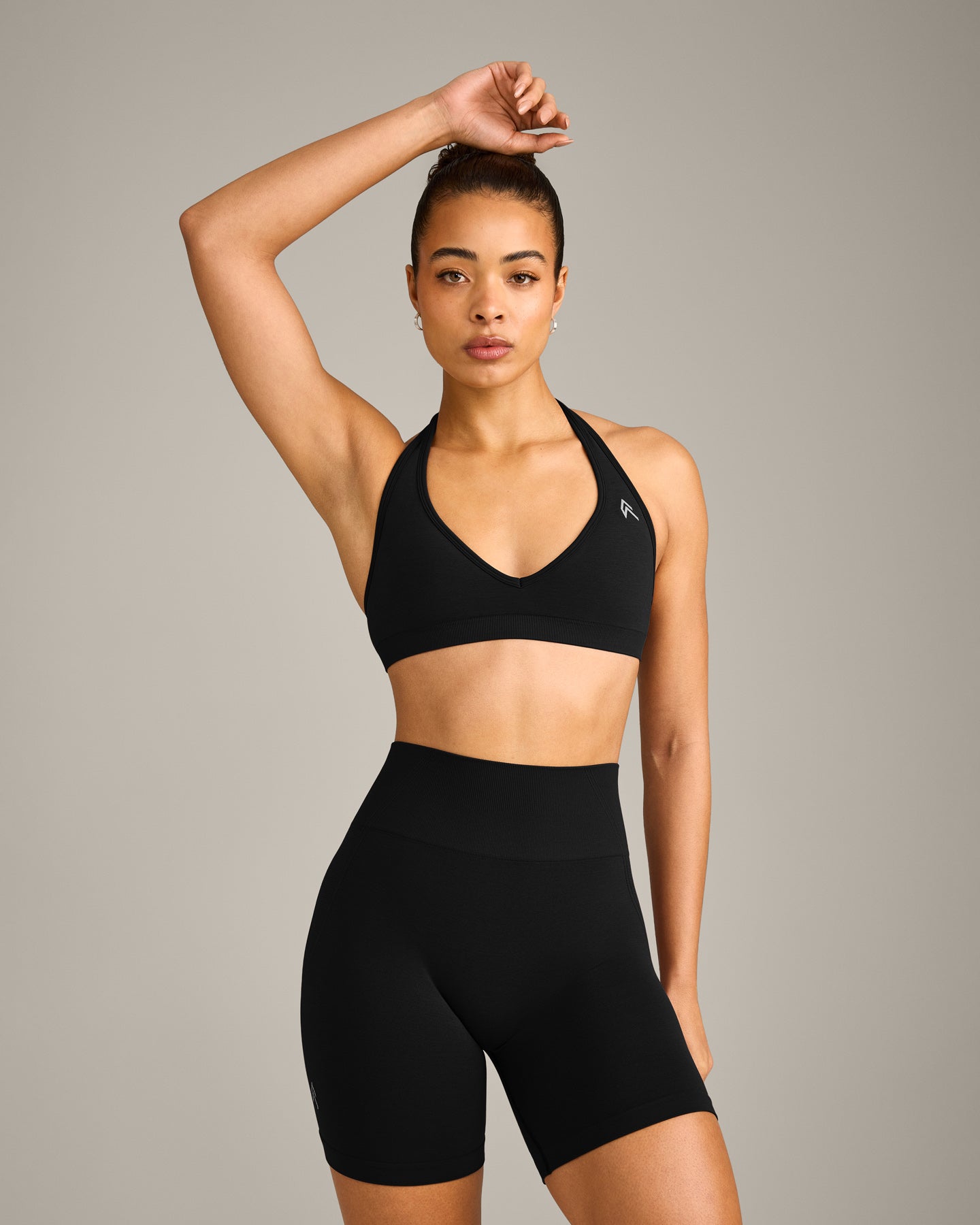 EffortlessLift Seamless Halter Neck Sports Bra with Grey Logo | Black