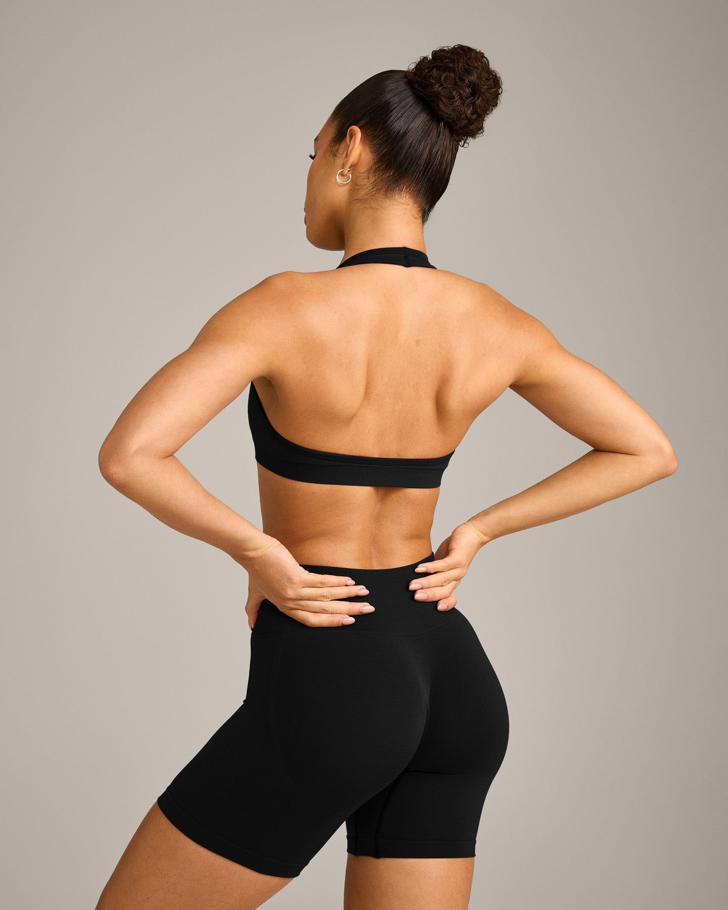 EffortlessLift Seamless Halter Neck Sports Bra with Grey Logo | Black - Image 6