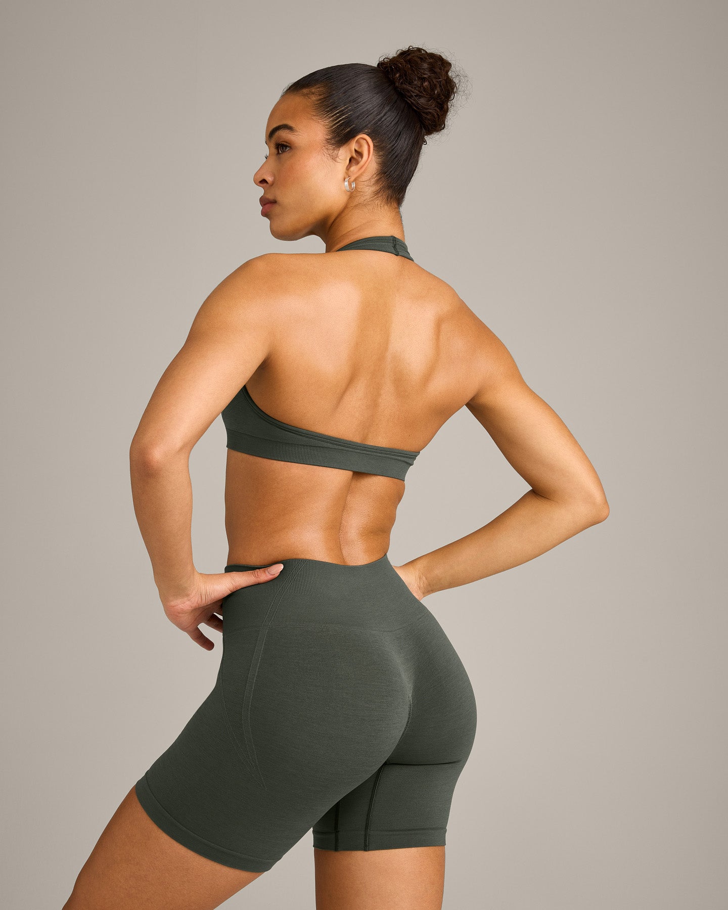EffortlessLift Seamless Halter Neck Sports Bra with Grey Logo | Dark Khaki - Image 6