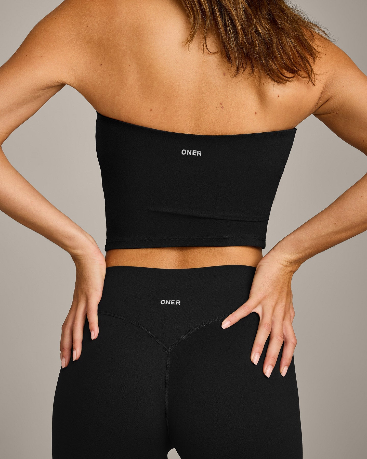 SoftMotion Bandeau Mid Vest with Built in Bra Shelf with Grey Logo | Black - Image 4