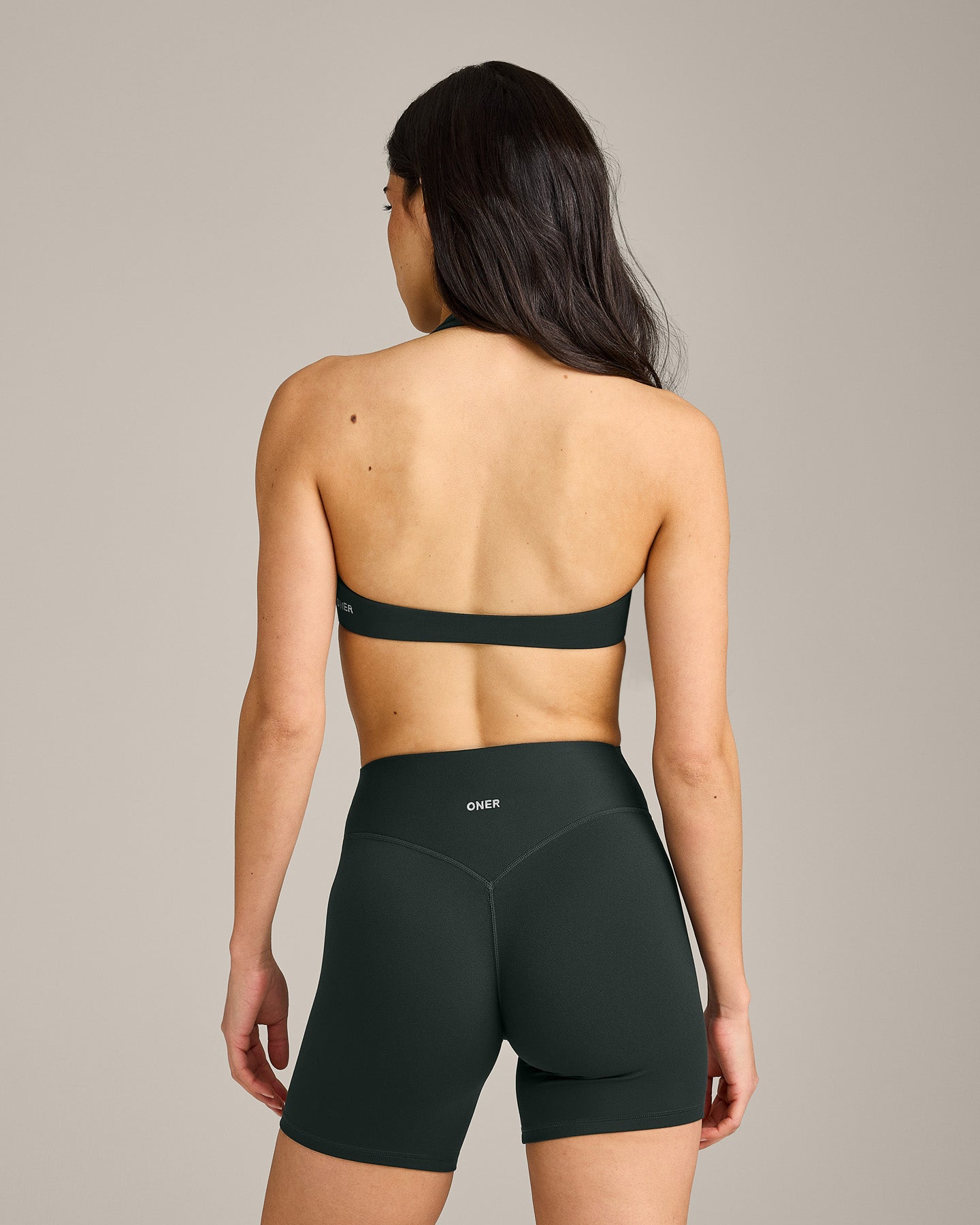 SoftMotion Minimal Halter Neck Bralette with Grey Logo | Emerald Noir - Image 6