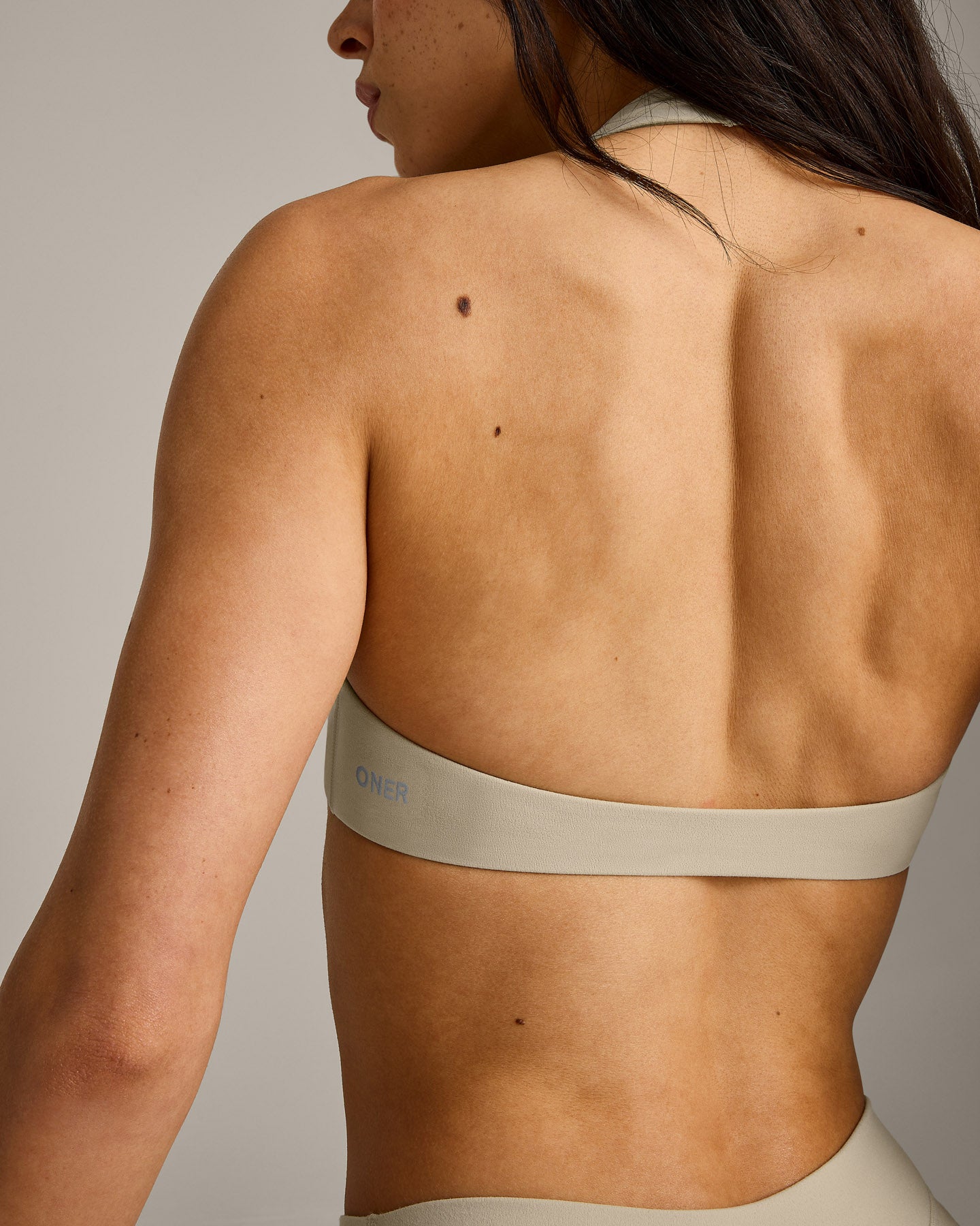 SoftMotion Minimal Halter Neck Bralette with Grey Logo | Oatmeal - Image 5