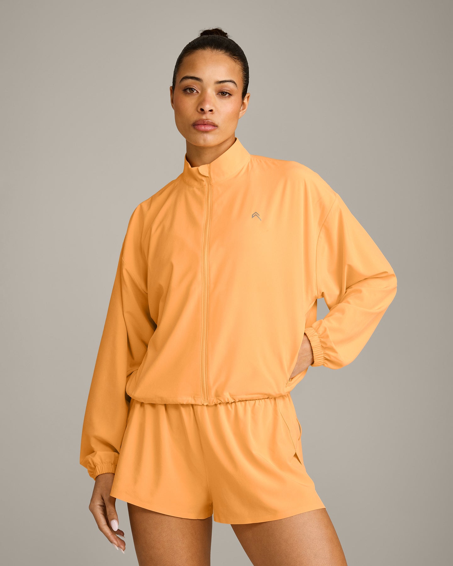 AirMove Jacket with Bonding with Reflective Logo | Powdered Orange