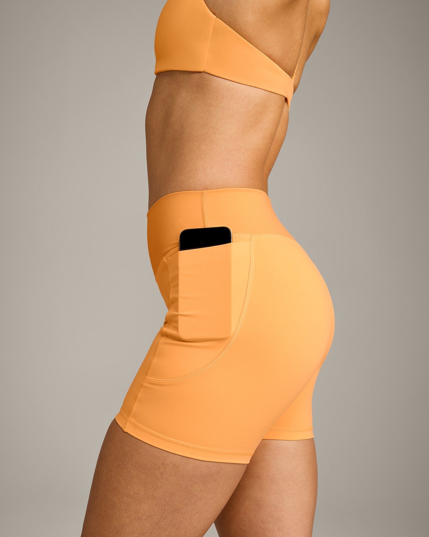 UnifiedMove Pocket Shorts 6" with Bonding with Reflective Logo | Powdered Orange - Image 4