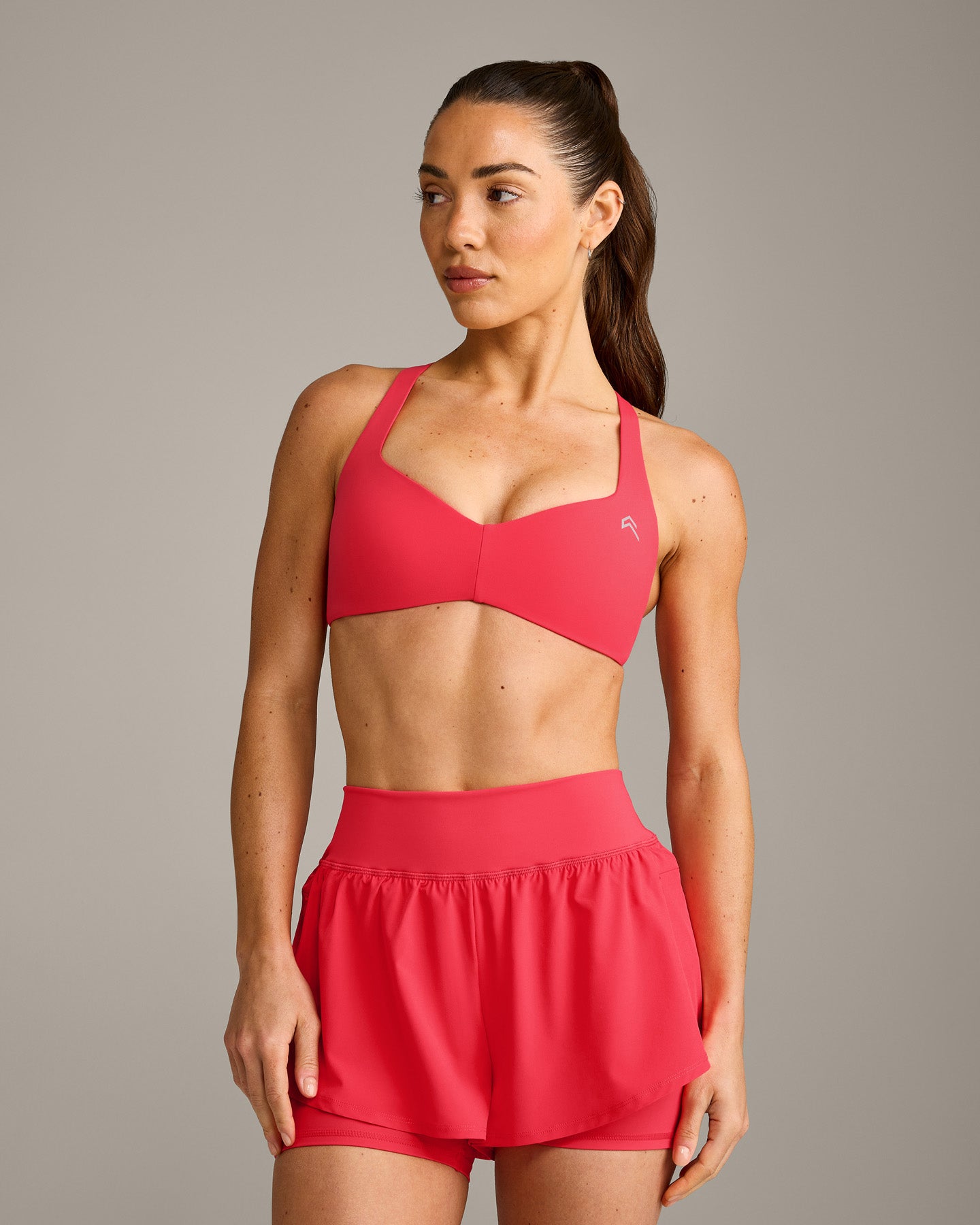 UnifiedMove T Back Minimal Bralette with Reflective Logo | Charged Pink
