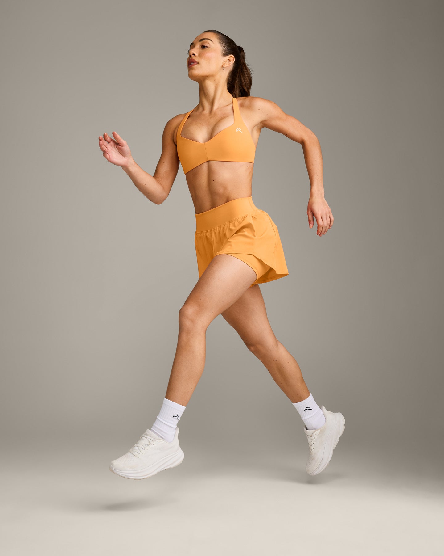 UnifiedMove T Back Minimal Bralette with Reflective Logo | Powdered Orange - Image 3